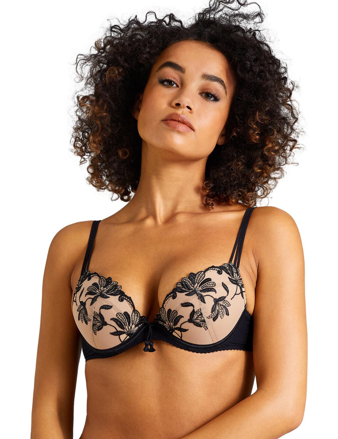Be bold with the Aubade Lovessence push up bra, a luxurious and breathtaking lingerie piece crafted for the modern woman who seeks luxury and quality. With its plunging neckline and padded cups, this push up bra was designed for an amazing uplift and shape. The underwired support and adjustable shoulder straps and hook and eye fastening ensure that you’ll always find your perfect fit. With its stunning lace details, along with eye-catching bow detail, this piece is sure to turn heads. To complete the luxurious lingerie set, Aubade has a range of matching lingerie pieces available. Dare to feel beautiful and indulge in the Aubade Lovessence push up bra today.  Luxurious push up bra Plunging neckline Padded cups Underwired for support Hook and eye fastening Adjustable shoulder straps Stunning lace details Bow detail Matching lingerie available Country of origin: Tunisia Composition: Embroidery: 50% Polyester &pipe; 35% Polyamide &pipe; 15% Elastane Composition: Lining: 100% Polyamide Composition: Bottom lining: 100% Cotton Composition: Top lining: 100% Polyester Composition: Knit: 82% Polyamide &pipe; 18% Elastane Listed in UK sizes  61605-106748-1421928 RMN18 Push Up Bra