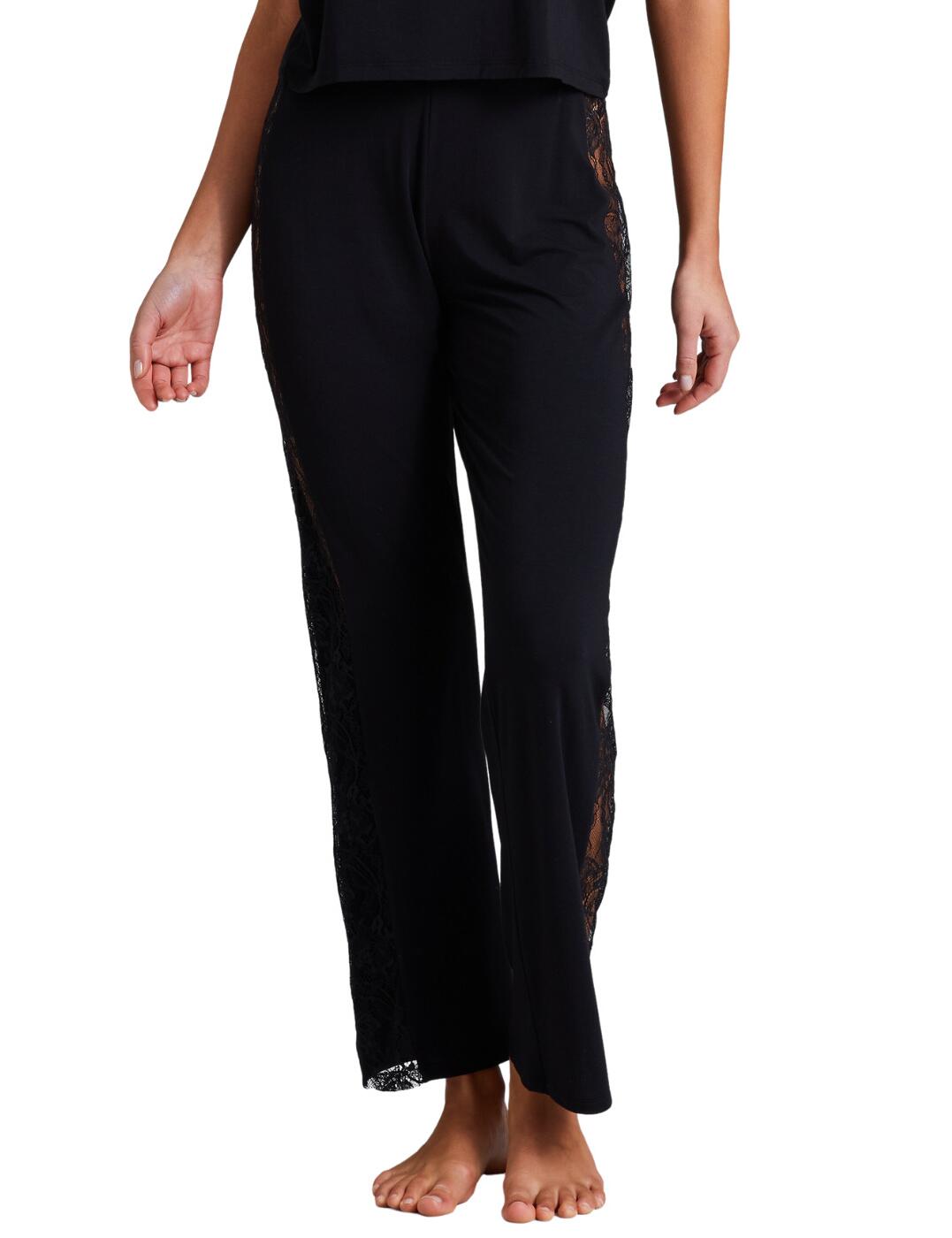 Make a statement with Aubade’s Lazy Days pants. An indispensable piece of lingerie, these gorgeous pants provide undeniable comfort while making a bold statement. Crafted in luxurious lace details and elegant sheer panelling, Aubade’s Lazy Days pants are the perfect complement to any look. With their high-rise waist and flattering silhouette, these pants exude sophistication and style. These pants can be paired perfectly with any Aubade lingerie from this amazing range, creating an effortless tied look. Aubade’s Lazy Days pants are the perfect addition to any wardrobe.  Gorgeous pants Elegant sheer panelling Luxurious lace details High-rise waist Matching lingerie available County of origin: Portugal Composition: Lace: 100% Polyamide Composition: Knit: 79% Modal &pipe; 14% Silk &pipe; 7% Elastane Listed in UK sizes  61611-106756-1421976 RL60 Loungewear