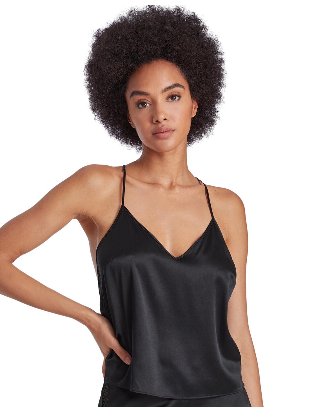 Step up your sleepwear game with the Aubade Silk Desire cami top. Featuring a plunging neckline and bareback, as well as crossover shoulder straps for a modern take on the camisole. But that’s not all! The ladder stitch in the graphic band at the hem creates a subtle transparency that is wearable and fashionable. It is full-length, with narrow adjustable shoulder straps for a more comfortable fit. Best of all, a matching coordination set is also available to complete your nightwear look. Add a touch of elegance to your evenings with the super soft Aubade Silk Desire cami top!  Sleep cami Soft silk fabric Plunging neckline Bareback Crossover shoulder straps The ladder stitch in the graphic band creates transparency Full length Narrow, adjustable shoulder straps Matching coordinates available Country of origin: China Composition: Main Fabric: 92% Silk &pipe; 8% Elastane Composition: Embroidery: 100% Polyester Listed in UK sizes  61633-106783-1412220 RJ38 Camisole Top