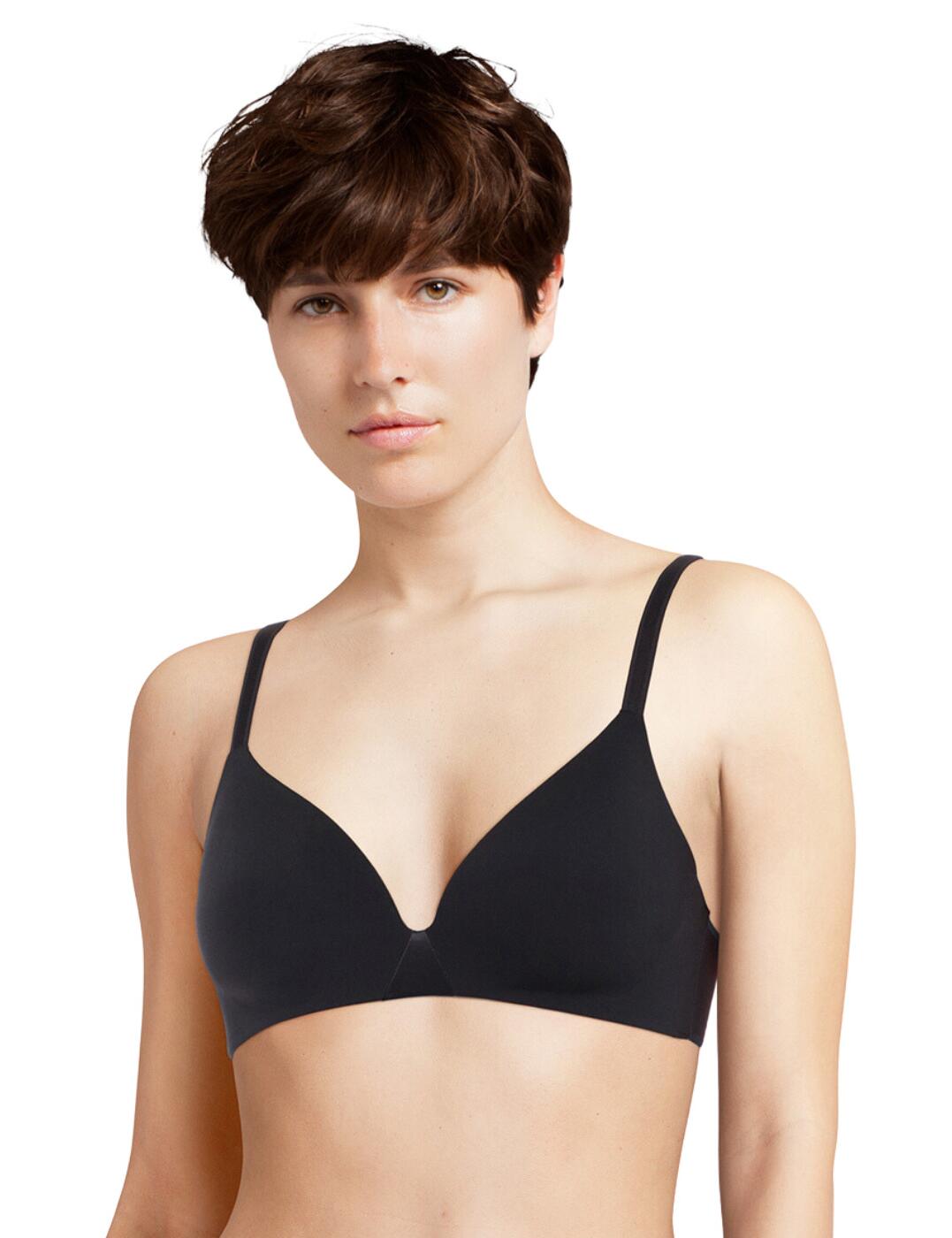 Add a touch of classic luxury to your everyday lingerie collection with this superbly designed non-wired t-shirt bra from Chantelle's Essentiall collection! Ultra comfortable, wirefree triangle cups in a smooth, soft knit, sit on a base, ensuring you feel adequately supported as you go about your day. The soft and semi-rigid cup pads give extra reassurance. The seamless finishes and the gorgeous smooth materials give a comfortable, second-skin feeling, making this bra invisible under even the most form fitting clothing! The lined chimney back, fully adjustable straps, and 4-rank padded hook and eye closure offer further support and an individualised fit, perfect for all body types. Features the Chantelle logo embossed on the side. Pair with coordinating briefs from the Essentiall range to complete this classic look!  Stylish non-wired t-shirt bra Soft knit, smooth cups for comfort and invisibility Fully adjustable straps 4-rank hook and eye closure Non-wired and lightly padded Chantelle logo on the side Matching items available Country of origin: Vietnam Composition: Main: 75% Nylon &pipe; 25% Elastane Composition: Knit inside cups: 100% Polyester Composition: Knit lining back: 58% Nylon &pipe; 42% Elastane Listed in UK sizes  61474-106542-1408586 C15G80 T-Shirt Bra