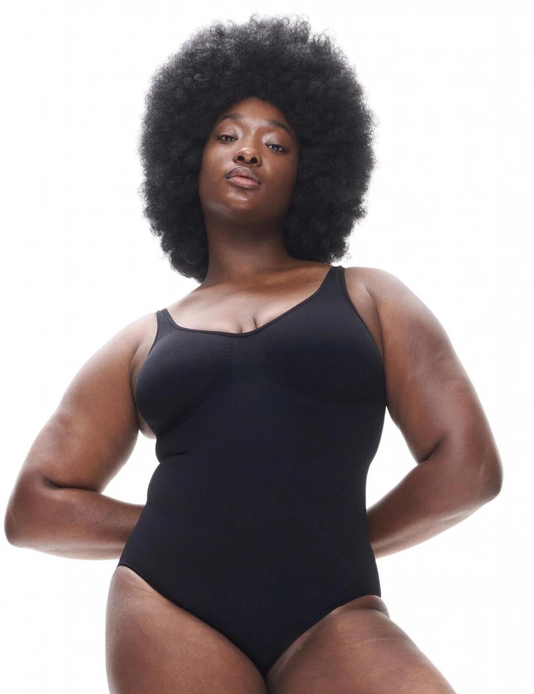 Embrace a beautiful silhouette with the Heist Contour Seamless Bodysuit. This revolutionary design is engineered with medium compression to provide you with enhanced body support. A scooped neckline, full cup coverage and non-wired 3D knit cups are designed to give you a lifted, defined bust. Plus, it has adjustable shoulder straps and snapped gusset for ease of wear. This contemporary bodysuit is also made with non-padded comfort for all-day wear. With medium compression throughout, the Heist Contour Seamless means you can look your best without the need to adjust! Forget conventional shapewear that hugs your body too tightly; with a flattering contoured shape and moderate rear coverage, the Heist Contour Seamless Bodysuit provides natural-looking support for all shapes and sizes!  Seamless bodysuit Lifts and defines bust Scooped neckline Full cup coverage Non-wired and non-padded for comfort Medium compression for a flattering shape 3D knit cups enhance silhouette Smooths and shapes torso Snapped gusset Adjustable shoulder straps Moderate rear coverage Country of origin: Italy Composition: 82% Polyamide &pipe; 18% Lycra Elastane Listed in UK sizes  61884-107115-1423518 4407 Body