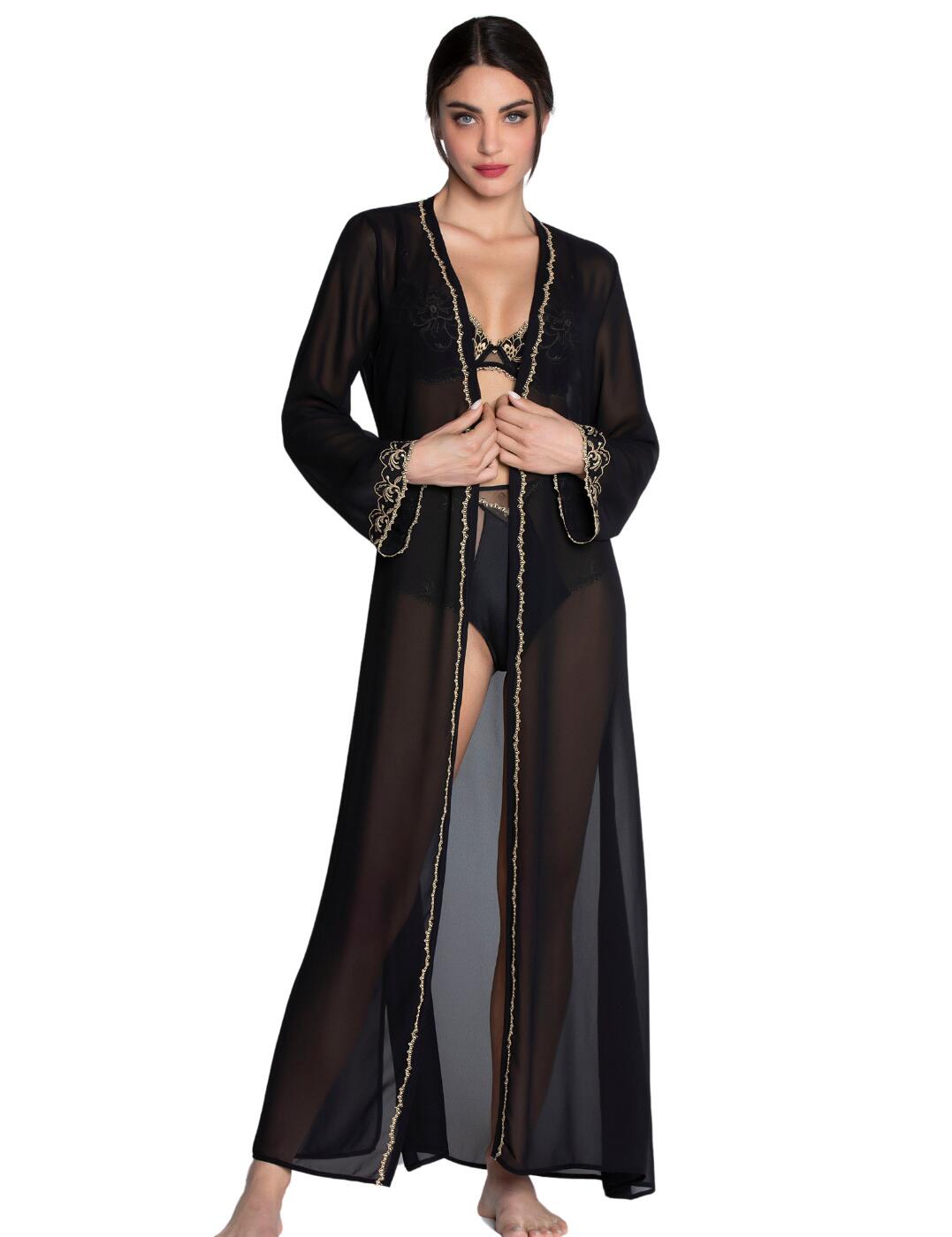 Treat yourself to something special this season such as the Lise Charmel Eblouissante Icone long robe. Crafted from the finest long chiffon, this robe is truly the epitome of sophistication. Delicate scalloped embroidered band along the bust adds a touch of femininity, while the embroidered cuffs exude a sense of opulence. The robe also comes with a tie at the waist belt, allowing you to create the perfect fit and accentuate your curves. You can also complete the look with the matching nightie for a coordinated luxury nightwear set.