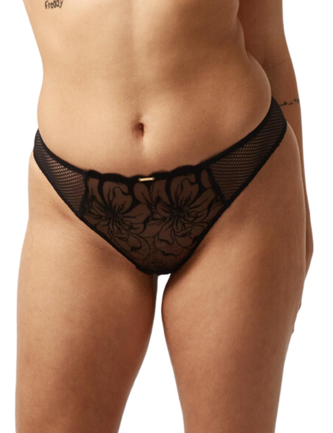 Bring out your playful side with this elegant and seductive tanga brief from Chantelle's Fleurs range! Sophisticated and luxurious, these briefs are crafted with a low-rise design with minimal rear coverage to flatter your figure perfectly. The 100% cotton gusset ensures a comfortable fit, suitable for everyday use, while the elastic finishes at the waist, thighs, and sides, make these briefs even more comfortable, and minimises visibility under form fitting clothing. The classic Chantelle branded plaque on the waist finishes off this piece with an opulent flourish! Coordinate with matching items from the Fleurs range to complete the look.  Luxury shorty brief Low-rise waist Minimal rear coverage Floral embroidery and honeycomb fishnet inlays on the sides 100% cotton gusset Branded plaque on the front Elastic finish at the waist, thighs and sides Matching bra available Country of origin: Morocco Composition: Embroidery: 51% Nylon &pipe; 28% Polyester &pipe; 21% Elastane Composition: Lace: 77% Nylon &pipe; 23% Elastane Composition: Knit: 100% Cotton Listed in UK sizes  61504-106578-1408785 C12M90 Tanga Brief
