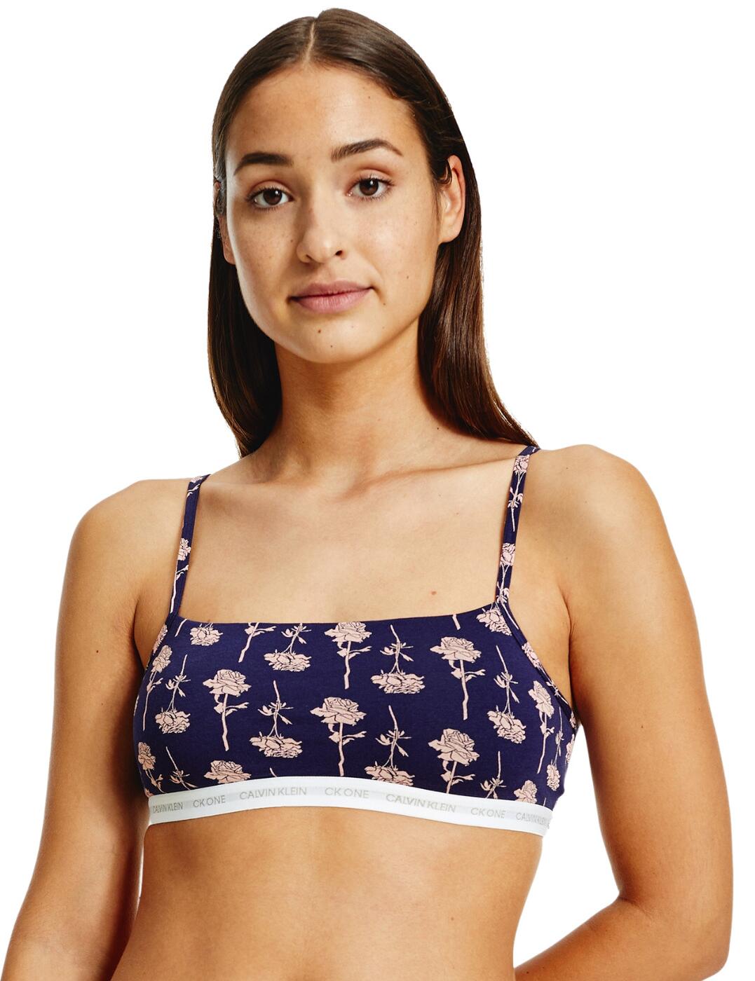 The CK One Cotton collection boasts premium lingerie and loungewear with a recognisably Calvin Klein athleisure look. This convenient pack of two unlined bralettes are comfortable and perfect for everyday wear. The iconic branded underband adds a designer touch to the classic minimal style. A non-wired and non-padded design offers a comfortable fit that is ideal for all-day or lounging. Matching lingerie is available from the CK One Cotton range by Calvin Klein.  Iconic Calvin Klein underband Sporty square neckline Pull-on design Non-wired and non-padded Adjustable straps Country of origin: Sri Lanka Composition: 55% Cotton &pipe; 37% Modal &pipe; 8% Elastane Listed in UK sizes  51910-95792-1245202 000QF6040E (W5B) Pack of 2 Bralettes