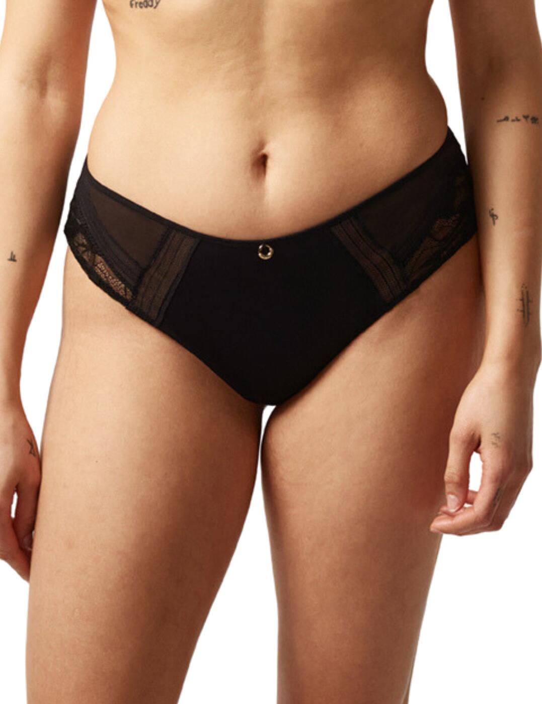 Take your lingerie game up a notch with the luxurious and comfortable Chantelle True Lace shorty brief. Featuring a mid-rise waist and smooth, eye-catching lace side panels, you'll look and feel your best when wearing this gorgeous piece. The graphic band detailing on the sides offers a modern twist, while the elastic waistband keeps it snug and secure against the body. The glamourous design is further enhanced by a branded charm on the centre front, as well as moderate rear coverage that shows off your curves without compromising on comfort or coverage. And for those who want a complete look, there's a range of matching coordinates available that will complete any lingerie collection.  Shorty brief Mid-rise waist Smooth lace side panels Graphic bands on the sides for a modern look Elastic waistband Branded charm on the centre front Moderate rear coverage Matching coordinates available Country of origin: Thailand Composition: Knit: 78% Nylon &pipe; 22% Elastane Composition: Lace: 91% Nylon &pipe; 9% Elastane Composition: Gusset lining: 100% Cotton Listed in UK sizes  61529-106614-1408853 C11M40 Short Brief