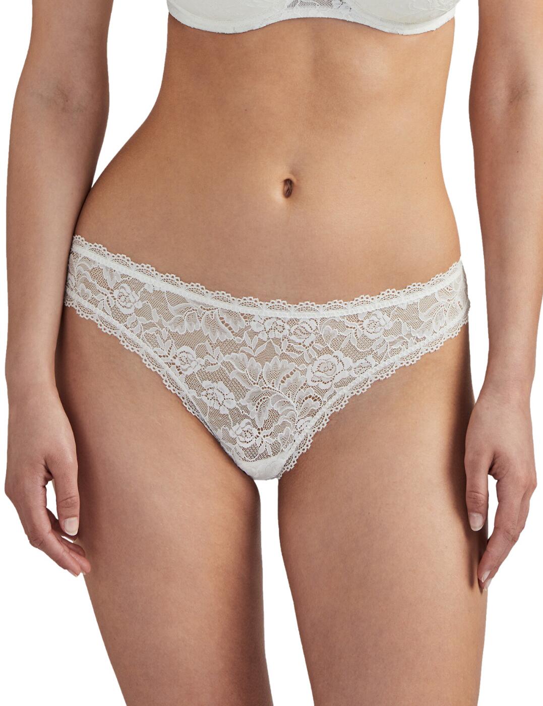 Welcome to true luxury with Aubade's Rosessence tanga brief. This stunning lace piece adds a touch of extravagance to your lingerie drawer. This attention-grabbing piece features a low-rise waist and minimal rear coverage, giving you an effortlessly sultry look. The luxurious lace details complete the picture, providing you with an irresistible temptation. And the perfect finishing touch? A matching lingerie set is available.  Stunning lace tanga brief Low rise waist Minimal rear coverage Luxurious lace details Matching lingerie available Country of origin: Tunisia Composition: Front Lace: 85% Polyamide &pipe; 15% Elastane Composition: Lace Back: 82% Polyamide &pipe; 18% Elastane Composition: Seat: 100% Cotton Listed in UK sizes  62097-107397-1423955 HK26 Tanga Brief