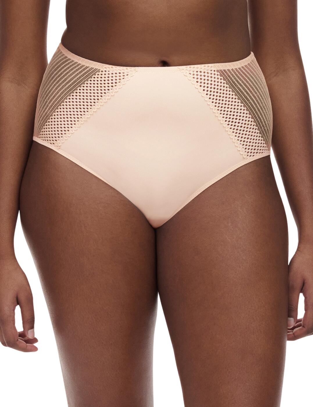 Exude confidence and luxury this season with the Chantelle Play full brief. With its high-rise waist, this brief provides both comfort and support, making it an essential piece for your everyday wear. Crafted with the utmost care, it is made from a breathable patterned tulle and delicate lace on the sides, adding a touch of elegance and femininity to your undergarments. The lined fabric ensures modesty while maintaining a lightweight fit. And let's not forget about the moderate rear coverage, which provides just the right amount of support without sacrificing style. Complete your luxury lingerie ensemble with our coordinating pieces, available in the same exquisite design.