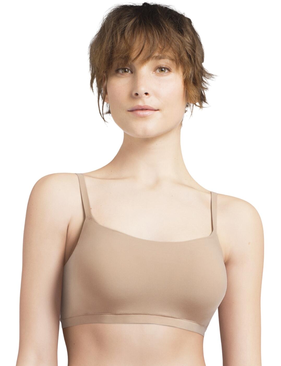Discover ultimate comfort with the Soft Stretch padded bralette by Chantelle, where luxury meets everyday ease. This must-have non-wired bralette offers lightly moulded padding to shape and support your curves, promising all-day comfort with sumptuously soft and stretchy fabric that feels like a second skin. The scoop neckline provides full bust coverage without sacrificing femininity while moisture-wicking properties keep you cool and confident no matter the occasion. With a bandeau back and pull-on design, this exceptional bralette also offers a bespoke fit thanks to thin, adjustable shoulder straps. Wear with matching Soft Stretch lingerie for head-to-toe luxurious comfort.