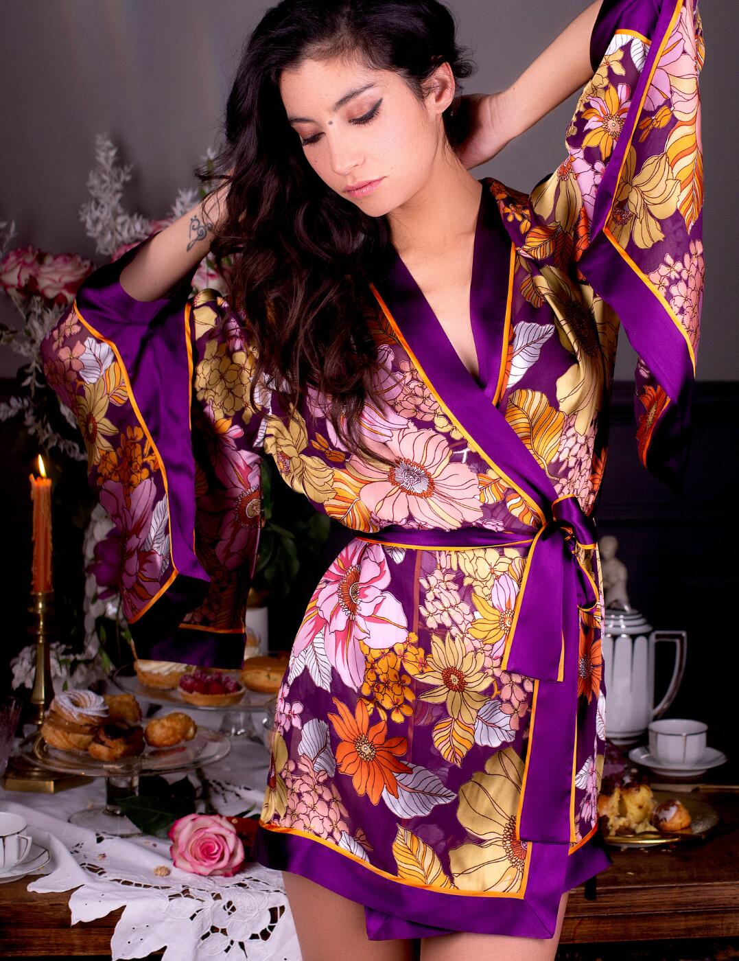 A botanical phenomenon, with a blast of vibrant colour, reminiscent of a firework display. Marjolaine's 'Niamh' collection boasts exquisite florals, with statement-making block colour that frames the garment. This block colour continues across the middle with the two-shade waist tie that comes together to secure the negligee. This negligee dress is slightly loose-fitting for optimum comfort and a luxuriously, free-flowing feel. Offering optimum coverage, this garment will ensure you feel confident and comfortable whilst lounging at home, or at your favourite vacation residence.  Beautiful, botanical print adorns the garment Free-flowing design that offers a loose fit for optimum comfort Non-wired and non-padded design for a natural look Contrasting block colour commands attention We recommend washing this negligee dress by hand, and in cold water Country of origin: France Composition of Burn Out: 70% Rayon &pipe; 30% Silk Listed un UK sizes  52341-94158-1235165 2NIA2001/0123 Dressing Gown