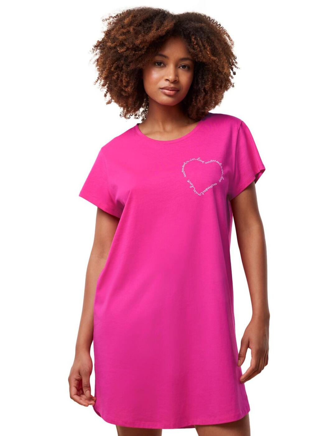 The Triumph Nightdresses NDK 02 X one-piece nightie is the perfect nightwear for women who seek simple but comfortable sleepwear. Made from super soft 100% cotton fabric, this nightie is breathable and will keep you cool and comfortable all night long. The short sleeves and mid-thigh length make it perfect for warmer weather, while the loose fit ensures that you'll have plenty of room to move around. The heart print with a slogan adds a touch of personality to this otherwise simple nightie.  Simple nightwear Super soft 100% Cotton fabric Short sleeves Mid-thigh length Comfortable rounded neckline Loose fit Heart print with slogan Easy pull-on style Country of origin: Vietnam Composition: 100% Cotton Listed in UK sizes  61737-106903-1415235 10215185 Nightdress