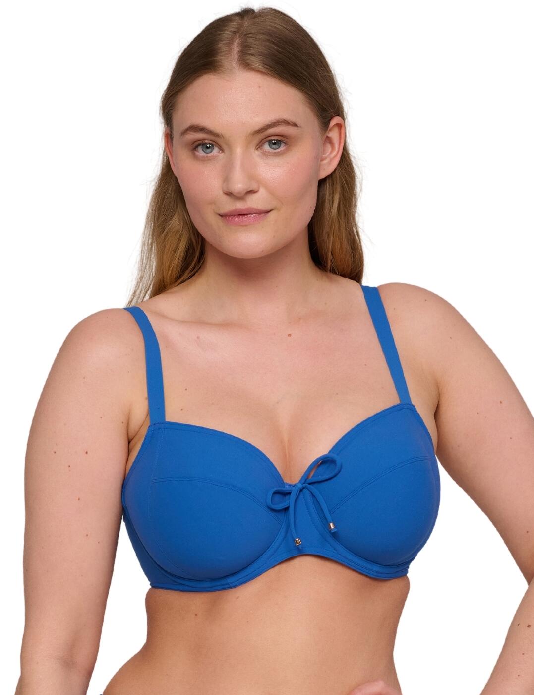 Elevate your holiday wardrobe with the Aswan full cup bikini top by Prima Donna Swim. This luxurious swimwear staple combines an uncomplicated design with premium fabric to create a versatile bikini top fit for any glamorous getaway. The underwired, three-piece cups gently lift and shape your natural curves, offering reassuring bust coverage without padding for comfortable all-day wear. Enjoy a customisable fit thanks to fully adjustable straps and a classic plastic clasp closure, while the playful bow at the centre adds timeless feminine charm. Whether you're lounging poolside or dipping into the waves, this bikini top promises cool and comfortable confidence - even better when worn with matching Aswan swimwear for a coordinated holiday look.