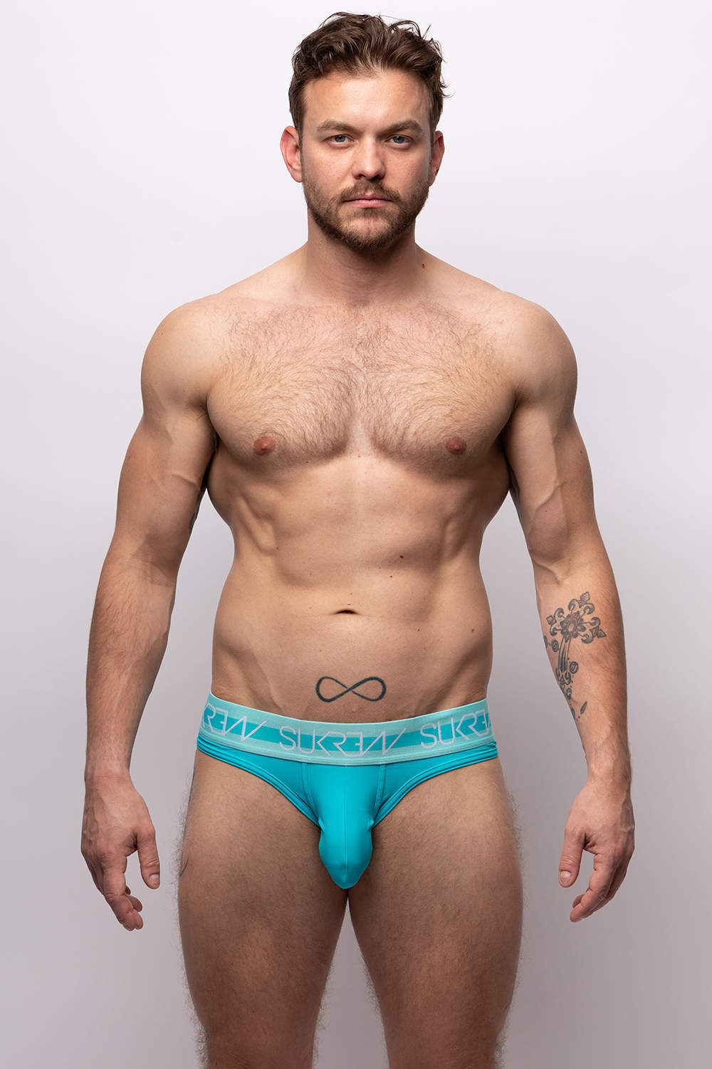 Sukrew Lagoon V Brief men’s underwear – classic male bikini up front and revealing jock behind. Shop sexy backless slips with large anatomical pouch