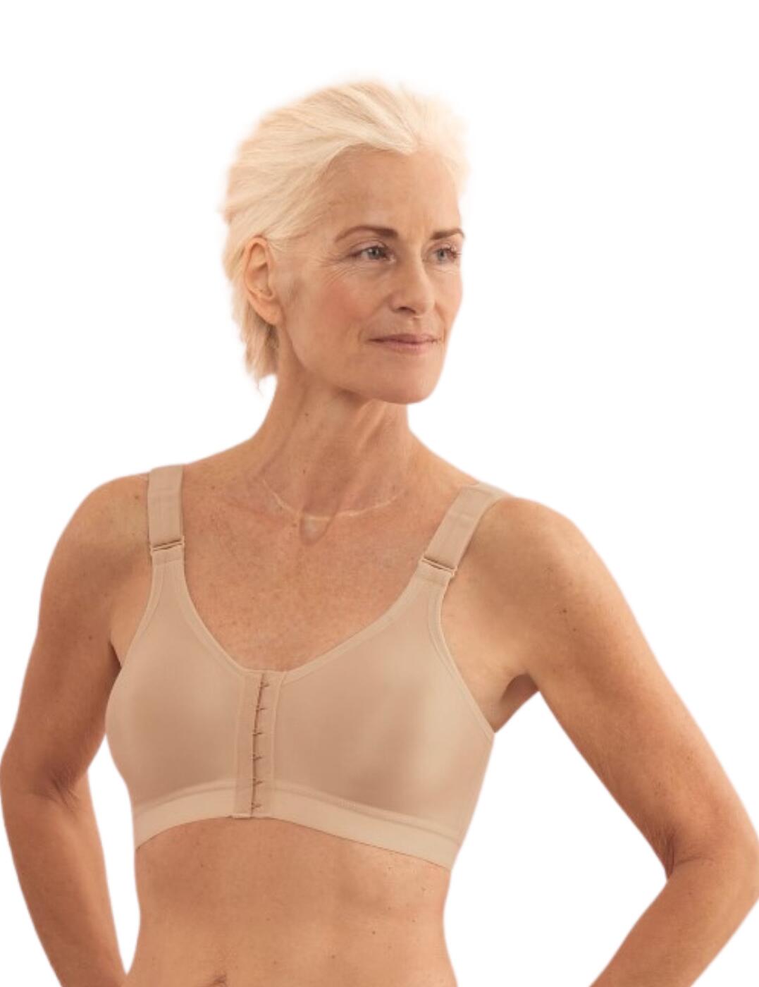 The Sydney compression bra by Anita offers the ultimate support for everyday wear. This compression bra is ideal for a comfortable everyday wear with a modest smooth full cup and soft non-padded design. The premium stretch fabric offers extreme support without the need for uncomfortable underwires. A front hook and eye fastening allow for easy wear and the thick straps are adjustable for the perfect individual fit.  Front fastening design Structured compressive design Thick adjustable straps Full cup shape High-quality stretch fabric Non-padded Non-wired Country of origin: Czech Republic Composition: 65% Polyester &pipe; 20% Polyamide &pipe; 10% Elastane &pipe; 5% Cotton Listed in specialised sizes  52412-94297-1234234 1091R Compression Bra