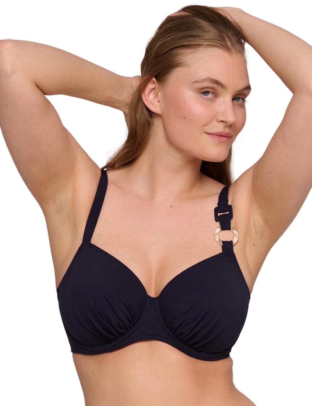 Up your swimwear game with this luxurious full-cup bikini top from Prima Donna Swim's Pinner collection. Featuring a glamorous metal ring on the straps, this piece exudes a minimalistic aesthetic. Meanwhile, a flattering gathered detail on the cups draws flattering attention to your curves. It has a hidden underwire for all-day support as well as fully adjustable straps which can be changed to a halter neck, giving you a versatile swimwear fit! The non-padded cups will subtly enhance your natural bust while the back clasp closure secures everything in place. Browse the Prima Donna Swim Pinner range for matching coordinates now to complete your classy holiday wardrobe.