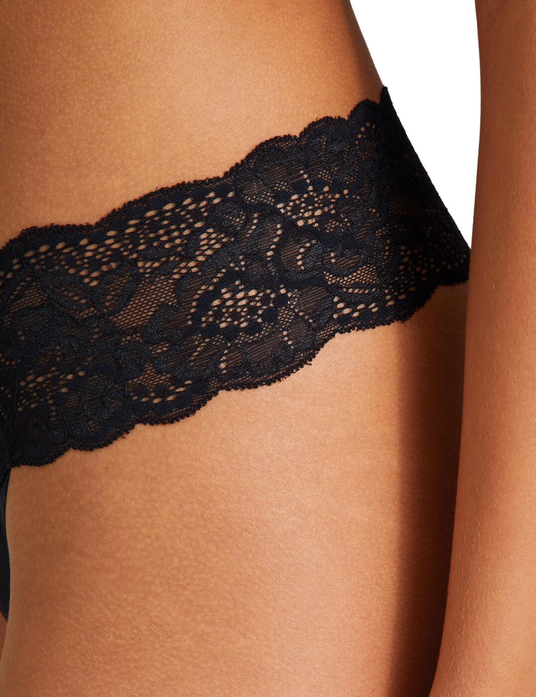 The Sweetessence thong is the perfect addition to your lingerie collection. This flirty but comfortable fit can go for many occasions. A sexy semi-sheer lace waistband gives an alluring glimpse of skin. Soft scalloped edges contour to your body for a complimentary fit that eliminates harsh lines. The soft opaque fabric preserves comfort and modesty while the minimal design highlights your curves.