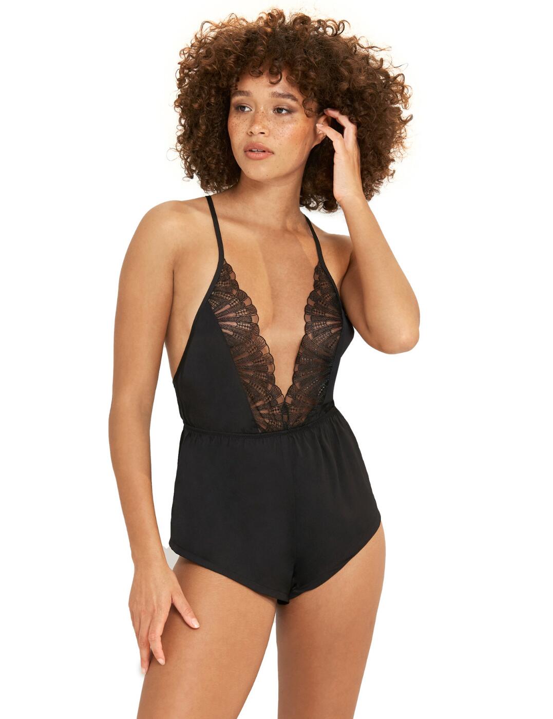 If you're looking for a little piece of lingerie that ensures comfort and provides more coverage whilst still being sexy and sophisticated, this teddy is perfect for you! A teddy is a super easy piece to wear with its pull-on style and adjustable cross-back straps with a gold circle charm in the centre of the back. It has a deep v neckline that creates a triangle-shaped cup that enhances your bust whilst the lace edging draws attention to your irresistible cleavage. The built-in shorts provide a cheeky rear coverage with a loose-fitting style making it the perfect piece to chill in.  Teddy Deep plunging neckline Lace edging down the neckline Pull-on style Adjustable cross-back straps Triangle-shaped cups Cheeky rear coverage Loose-fitting Country of origin: China Composition: 100% Polyester &pipe; Excluding trims Composition: Gusset: 100% Bamboo  Listed in UK sizes  41479-BK-6 41479  Body