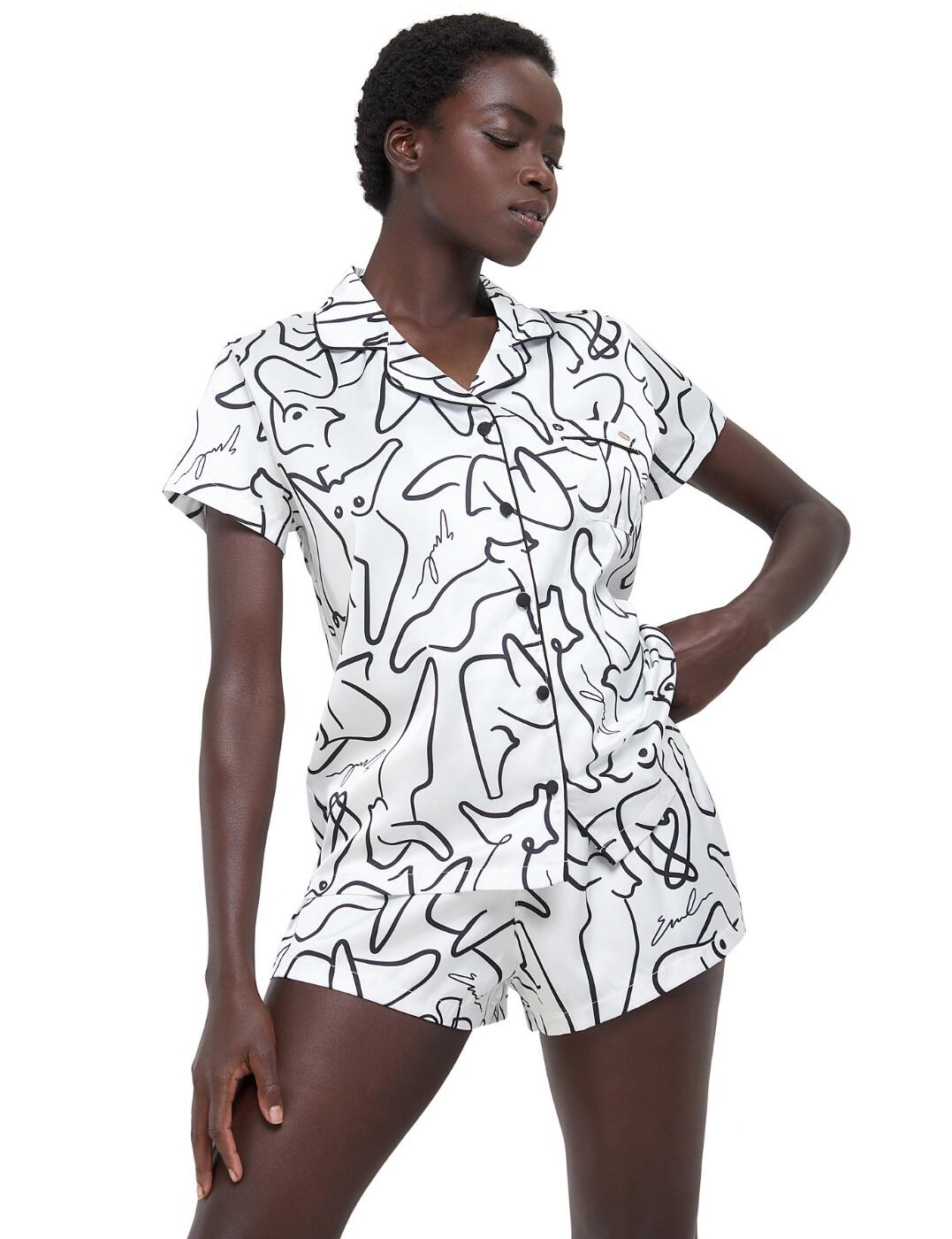 The Emcee range by Bluebella brings this cute shirt and short set that features an all-over female body print to empower and celebrate their beautiful figure. It has the classic style with a button-down shirt with short sleeves and a collar whilst the shorts are a mini fit with an elasticated waistband for a comfortable feel. The ultimate timeless and feminine piece.  Shirt and short set All-over female body abstract print Classic shirt style with a button-down front, short sleeves and collar Mini shorts with an elasticated waistband Country of origin: China Composition: 52% Polyester &pipe; 48% Elastane  Listed in UK sizes  41562-WHBK-6 41562 Pyjama Set