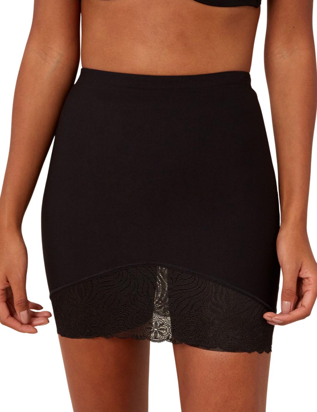 Sometimes you just want that perfect figure without sacrificing your style or comfort, and this Top Model shapewear skirt from Simone Pérèle is a perfect choice for exactly those situations. The elastic fabric hugs your curves and hides any imperfections around your stomach, buttocks and thighs. Inside, this skirt has integrated soft tulle panties that prevent the skirt from riding up. The smooth fabric fits perfectly with any outfit, remaining invisible under your clothes. This skirt features a scalloped lace panel on the bottom that elongates the silhouette and decorate your thighs.  Smooth Top Model shapewear skirt Sliming and sculpting effect Uniform fabric invisible under clothes Lace panels on the bottom of the skirt Approx. mid-thigh length Country of origin: Tunisia Composition: 69% Polyamide &pipe; 30% Elastane &pipe; 1% Cotton Listed in UK sizes  52919-95077 16R943 Shaping skirt