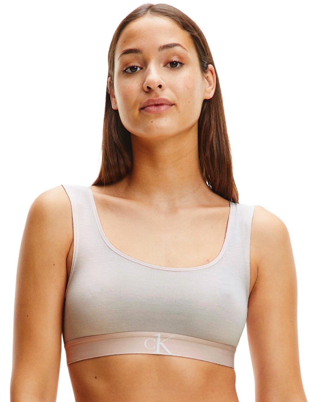 The CK One Plush collection offers a modern twist on Calvin Kleins classic athleisure style. This luxurious bralette has a CK One branded under band adding a designer look to the casual style. Non-padded for the utmost comfortable fit. For a designer relaxed style, wear with coordinating briefs from the CK One Plush collection by Calvin Klein.  Iconic CK One branded under band Rounded neckline Non-padded and non-wired Non-adjustable straps Country of origin: Sri Lanka Composition: 97% CMD &pipe; 3% Elastane Listed in UK sizes  53082-95304-1240072 F6669E  Bralette