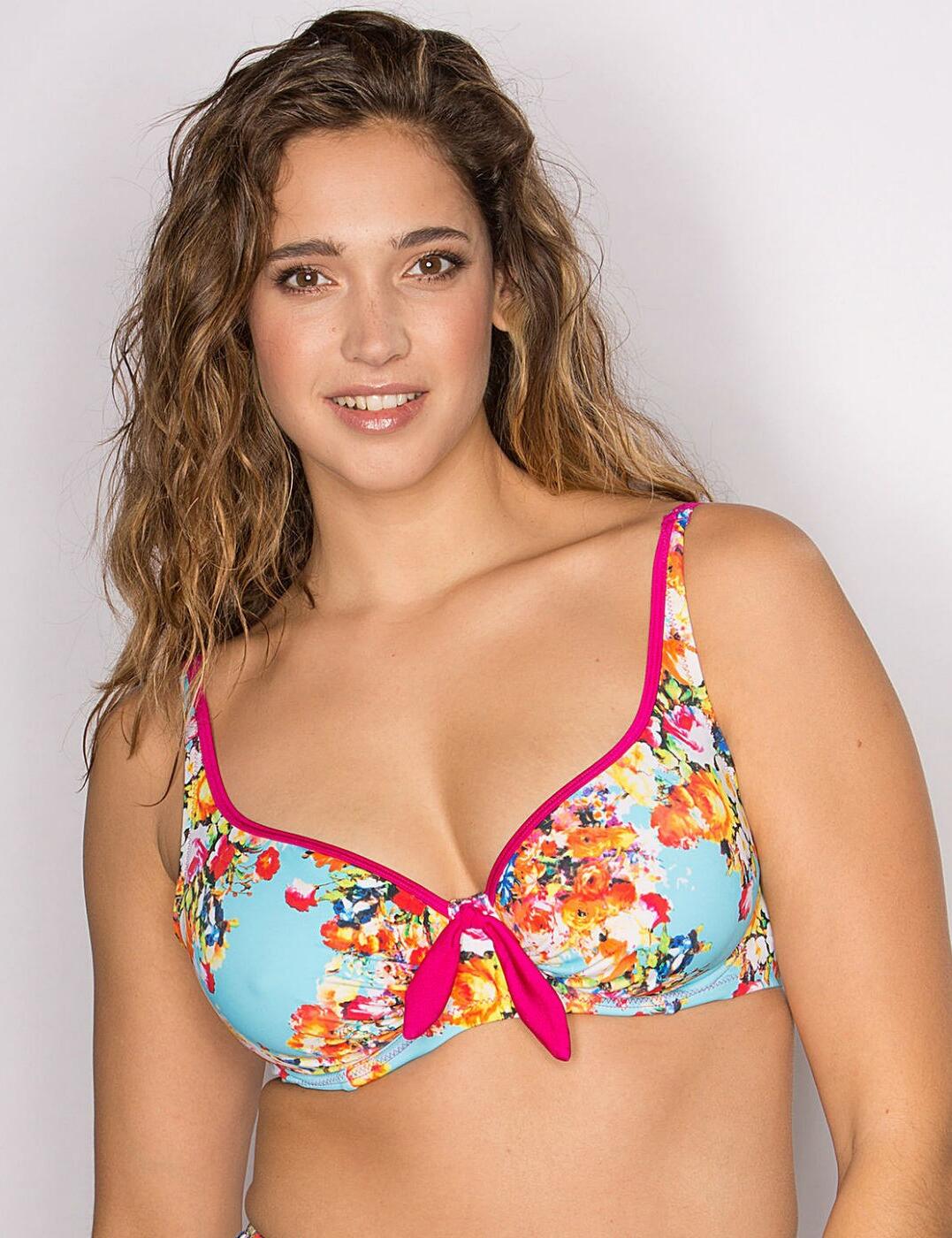 The Pour Moi? Seville range is perfect for those who love a feminine floral trend. The Seville features a beautiful summer blue base with an all over floral pattern finished with bright pink tubing around the edges.  Full coverage on cups Underwired for support and uplift Non-padded for a natural shape Adjustable & fixed straps Plastic clasp fastening Finished with pretty oversized bow Matching co-ordinates available Listed in UK sizes  25191-45349-543072 24002 Bikini top