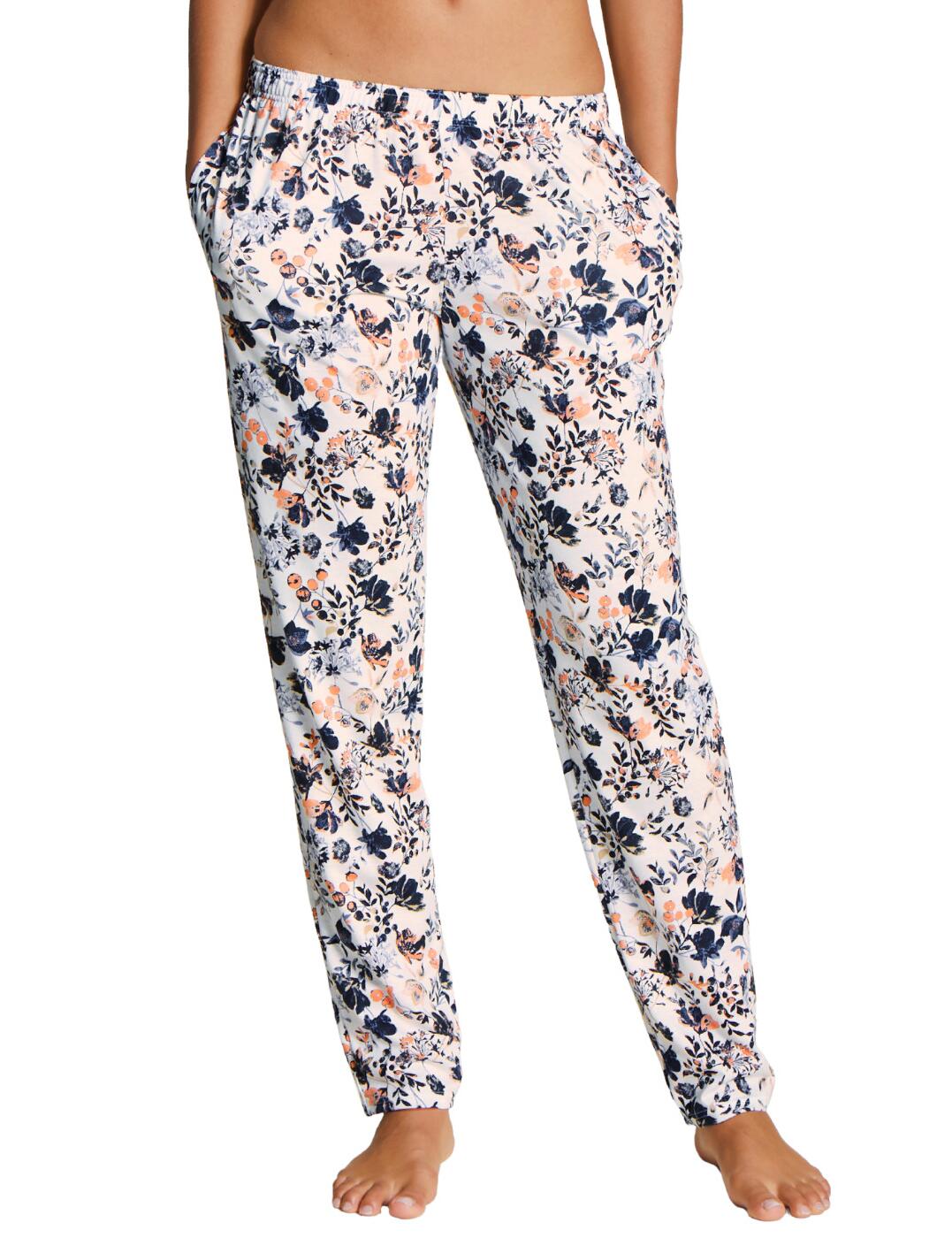 The Favourites Flowers collection blends bold floral prints with classic pyjama designs and Calida of Switzerland's renowned high quality. The convenient side pocket design means these timeless pyjama pants are also great as loungewear. An elasticated waistband creates a comfortable individual fit. Made from a super soft Cotton/Tencel blend for the utmost comfortable fit for the perfect night's sleep.  Timeless elegant style Full-length fit Comfortable elasticated waistband Super soft fabric Convenient side pockets Straight leg design Machine washable Country of origin: Hungary Composition: 50% Cotton &pipe; 50% Tencel Listed in UK sizes  53289-95570 29095 Loungewear