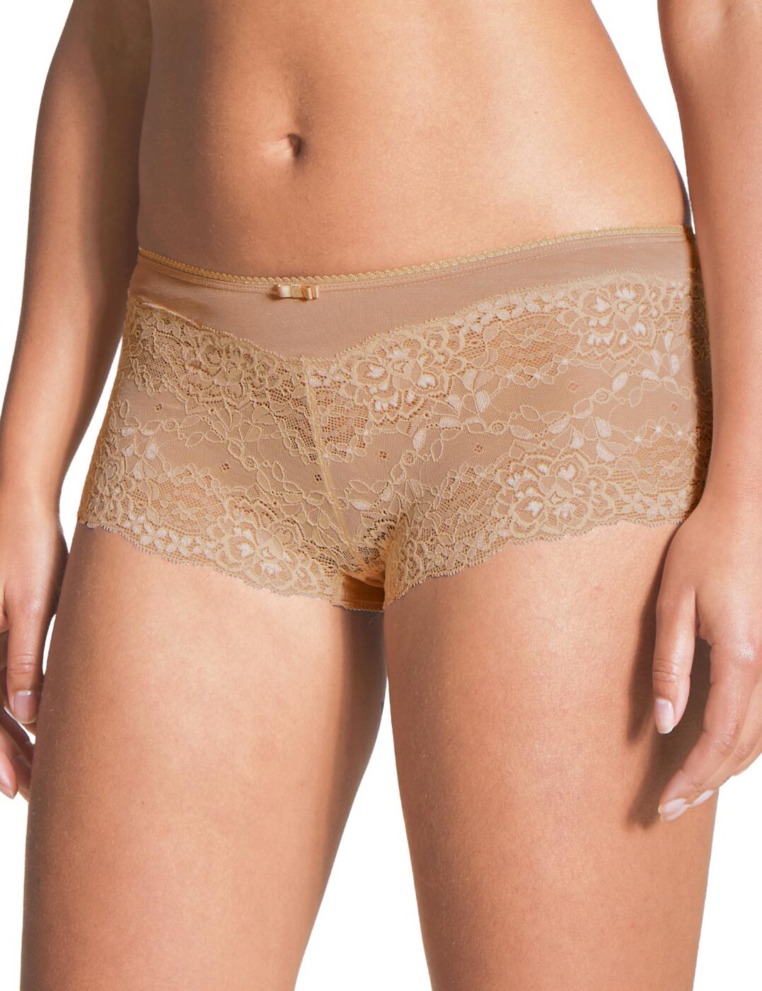 The Sensual Secrets collection by Calida of Switzerland offers flirty yet comfortable everyday lingerie. This shorty brief boasts a luxurious semi-sheer lace panel with a floral motif for an added feminine look. The mid-rise waist and moderate rear coverage offer a comfortable all-day fit. Pair with coordinates from the Sensual Secrets lingerie line by Calida of Switzerland.  Flirty semi-sheer lace Comfortable shorty brief design Moderate rear coverage Mid-rise waist Super soft stretch fabric Machine washable Country of origin: Hungary Composition: Main: 57% Viscose &pipe; 38% Cotton &pipe; 5% Elastane Composition: Lace: 87% Polyamide &pipe; 13% Elastane Listed in UK sizes  53314-95615-1243042 24331  Short Brief