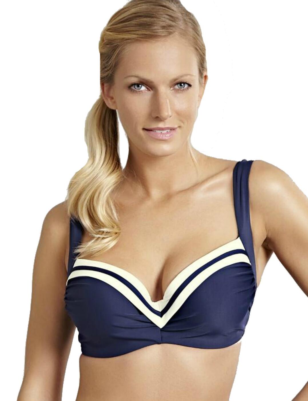 Look fabulous on the beach in the Panache Portofino Balcony Bikini Top. This particular bikini top is underwired, lightly padded and features powermesh lined wings to offer ultimate shape and support to the body. The contemporary design will have you feeling and looking great by the poolside. This premium piece features adjustable straps for an individual fit and fastens at the rear by a plastic clasp. The stylish bikini top also features wide front straps for additional comfort and support and is completed with decorative accents.  Contemporary, feminine design Stylish balcony design Comfortable, supportive fit and feel Moulded cups Underwired support Lightly padded for comfort and shaping Secures at the rear by plastic clasp Adjustable, wide straps for an individual fit Listed in UK sizes  33657-62217-923393 SW1212 Underwired Balcony Bikini Top