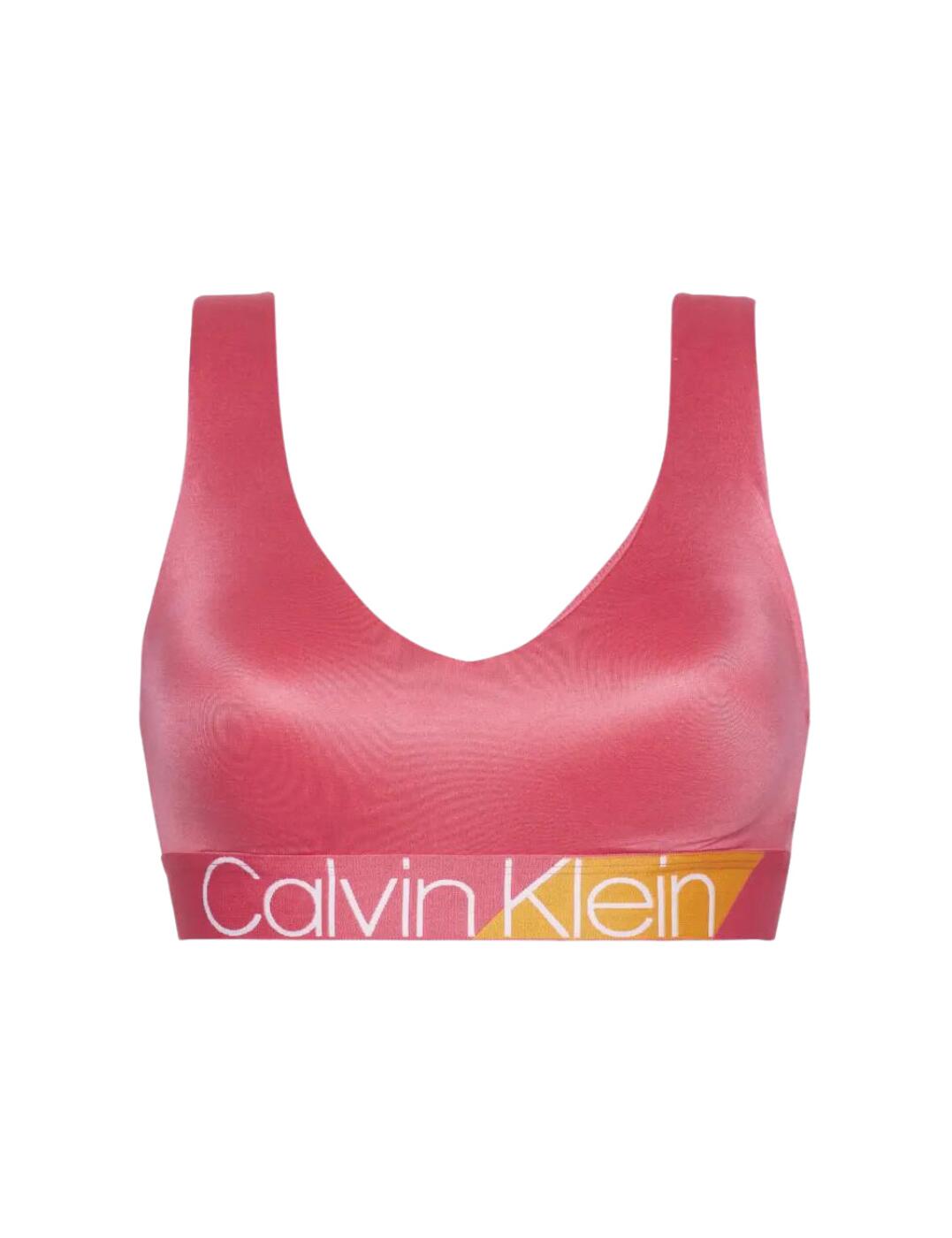 Bold and beautiful is how you will feel and look in this stunning bralette from the Bold Accents collection at Calvin Klein. Designed to stand out, it features the iconic CK branding on the underband with contrasting section for a pop of colour. The underband is also elasticated to offer the bust some flexible support without the need for underwiring. This bralette has been crafted from stretch fabric to allow for a unique fit, and the cross-over straps are non-adjustable, however the stretch in them will keep you supported whilst allowing great movement.  Bold and stylish design Calvin Klein elasticated underband Non-wired Stretch fabric for unique fit Cross-over straps, non-adjustable Plunging neckline Pull-on design Composition: 79% Nylon &pipe; 21% Elastane Listed in UK sizes  48822-88546-1188846  Bralette