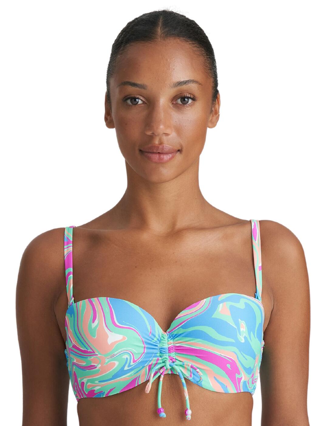 Upgrade your beach look with the Marie Jo Arubani strapless bikini top. This stunning piece is designed to provide a luxurious feel while still being stylish. The padding and underwired support gives extra lift and shape enhancing your bust. Plus, you can enjoy the versatile look of the adjustable bow strap detail - create the perfect ruched effect look to fit your personal taste. With the modern, double thin straps, removable straps and secure clip fastening you get the support you need while still being able to achieve that stylish and stunning look. For the ultimate versatile style, this piece also has multiway wearing - with adjustable shoulder straps. Snap up the available matching coordinates to complete the full look.