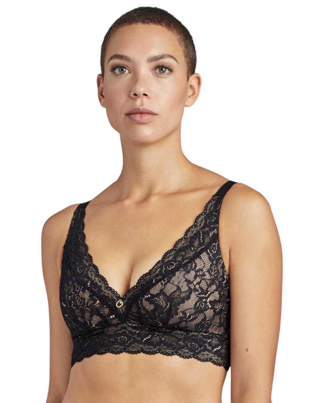 This wireless triangle bra by Rossessence from Aubade has been made with comfort in mind. The elasticated floral waistline with scalloped edging brings your shape in to really enhance your curves. The scalloped effect also follows down the plunging neckline which also highlights your breast's as the beautiful lace draws your eyes inwards. The floral lace which is inspired by the Ispahan rose covers the entire piece giving off a classy and feminine look, the stunning lace runs onto the back where there's a very wide back panel with is perfect for extra support as the straps running from the front to back can be of a slimmer style for a sleek aesthetic. This piece of lingerie is lined with a fabric to create a soft feel against your skin which also keeps you a little less exposed, as sensitive bits are gently tucked away in comfort.  Aubade's triangle bra From the sexy Rosessence range Wireless Full lace A cute ring stating the brand with a small gem in the middle lies in the middle of this gorgeous lingerie Scalloped edging Plunge design Elastic under the bust and supports in the cups Item lined in blocked fabric for hold Comfortable adjustable straps Wide fastening at the rear for greater hold and comfort Hook and eye fastening Wide side panels, bring your shape in A very sexy, feminine appearance Match with a Rosessence brief to make the most irresistible set Country of origin: Tunisia Composition: 85% Polyamide &pipe; 15% Elastane Listed in UK sizes  57513-101544-1316652 HK10-02 Comfort Triangle Bra