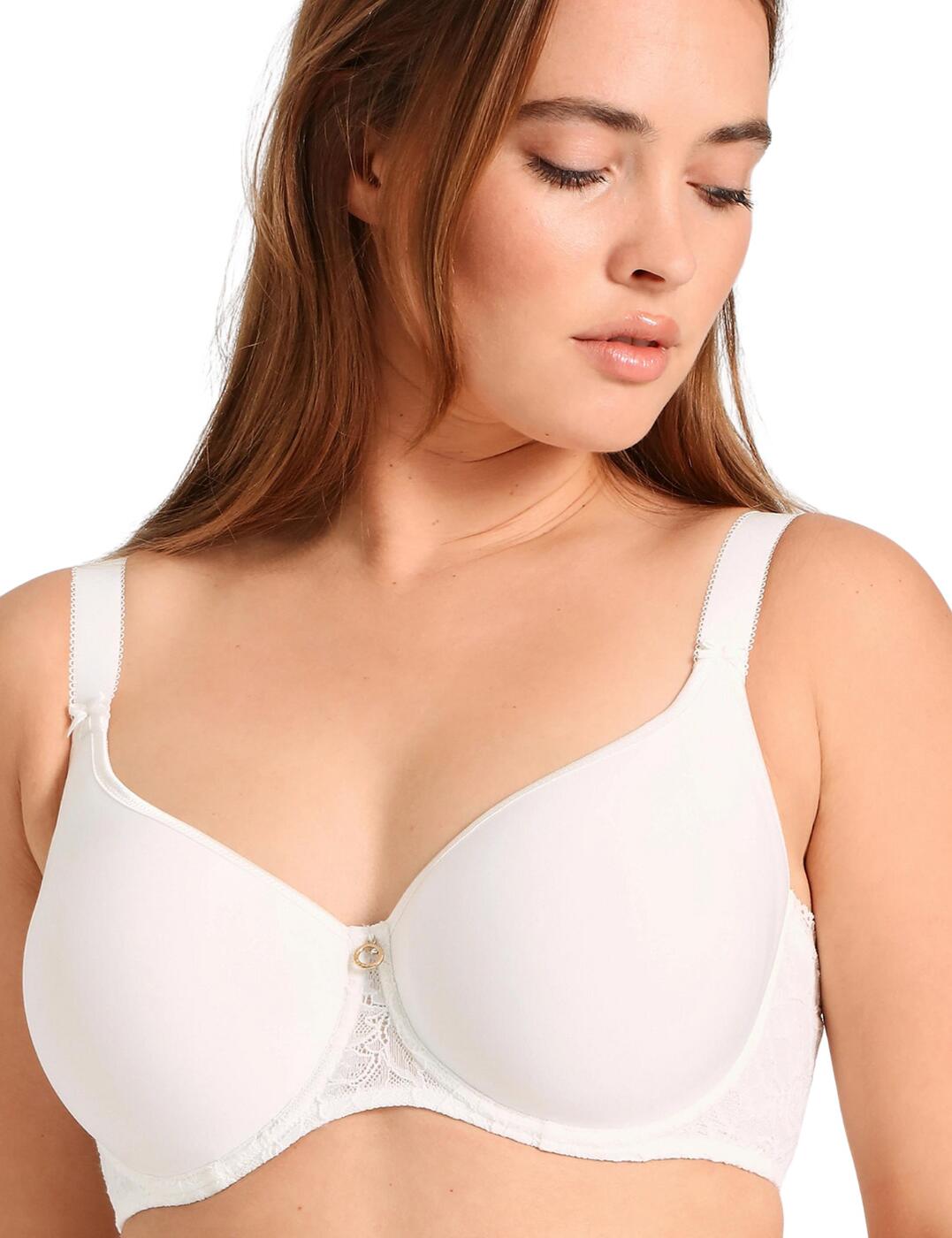This almost invisible spacer t-shirt bra from the Rosessece series by Aubade is the perfect piece for everyday wear, as it's comfortable and practical. This bra plays a twist on such a classic design as from the first look you wouldn't notice all the little gems hidden within this gorgeous bra. Where the adjustable straps meet the soft cups lay cute bows on either side and a small diamanté jewel with the Aubade logo illuminates the centrepiece. The stunning floral lace starts from the centre middle, running across the underband and onto the back where both sides of the lace meet the wide hook and eye fastening, which provides the strongest support for even the larger busts.  Aubade's spacer t-shirt bra From the stunning Rosessece series Soft, full cup coverage Underwired for extra support and hold Highly elastic jacquard lace trim Elasticised jacquard lace band Soft, adjustable elasticated straps Aubade-inscribed jewel with Swarovski crystals Romantic, feminine appearance Comfortable yet seductive Match with a pair of briefs from the Rosessece series making the perfect set Country of origin: Tunisia Composition: Lace side back: 82% Polyamide &pipe; 18% Elastane Composiiton: Middle lace: 85% Polyamide &pipe; 15% Elastane Composition: Lining: 100% Polyamide Composition: Cup lining: 70% Polyamide &pipe; 30% Elastane Composition: Lining back: 92% Polyamide &pipe; 8% Elastane Composition: Cup material: 89% Polyester &pipe; 11% Elastane Listed in UK sizes  57514-101548-1316659 HK09-02 Spacer T-Shirt Bra