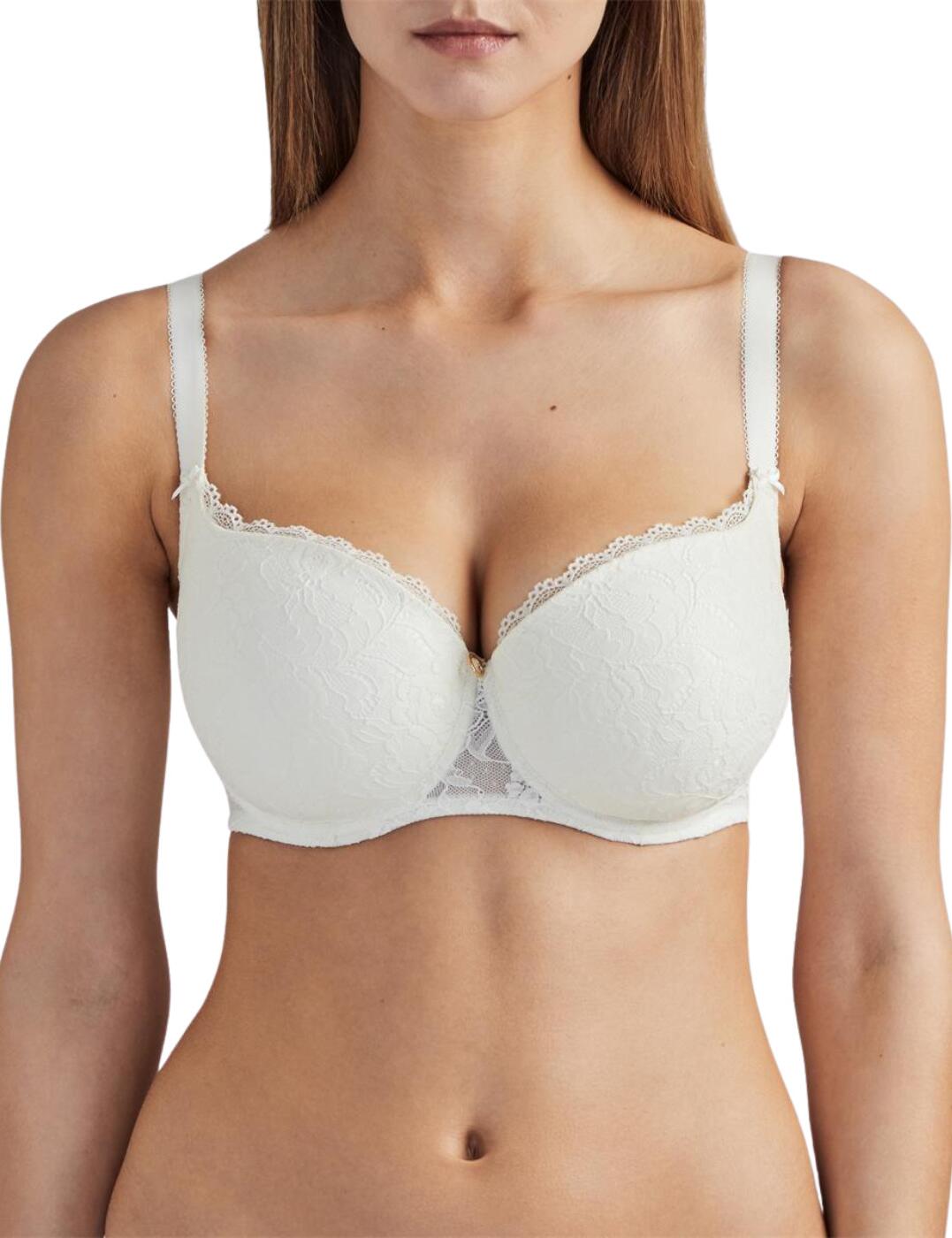 This remarkably comfy bra from the Rosessence series by Aubade is the epitome of comfort. The whole bra stretches with your entire body and moves with you thanks to its high-stretch jacquard lace along with the elasticated and adjustable straps that gently caress your shoulders as they support, and hold you firm throughout the day. The lace smoothers the entirety of the bra all the way around to the back where you will find an elegantly trimmed v-neck design where this gorgeous piece is held together by the classic hook and eye closure. Full cup coverage keeps you secure and classy and wide side panels softly bring your body in to highlight your shape. A little ring with branding along with diamonte acts as the centrepiece finishing the bra off nicely.  Aubade's moulded half-cup bra From the stunning Rosessence series Underwired for extra support Half-cup coverage Hook and eye fastening Highly stretch jacquard lace Elasticised straps with decorative picot and adjustable ability A jewel lies in the centre featuring the Aubade logo and Swarovski crystals Soft, fancy picot edging Floral lace design that runs onto the rear Country of origin: Tunisia Composition: Cup Lace: 72% Polyamide &pipe; 28% Elastane Composition: Lace side back: 82% Polyamide &pipe; 18% Elastane Composition: Middle lace: 85% Polyamide &pipe; 15% Elastane Composition: Cup lining: 100% Polyester Composition: Lining back: 92% Polyamide &pipe; 8% Elastane Composition: Middle lining: 100% Polyamide Listed in UK sizes  57515-101549-1316688 HK04  Moulded Half Cup Bra