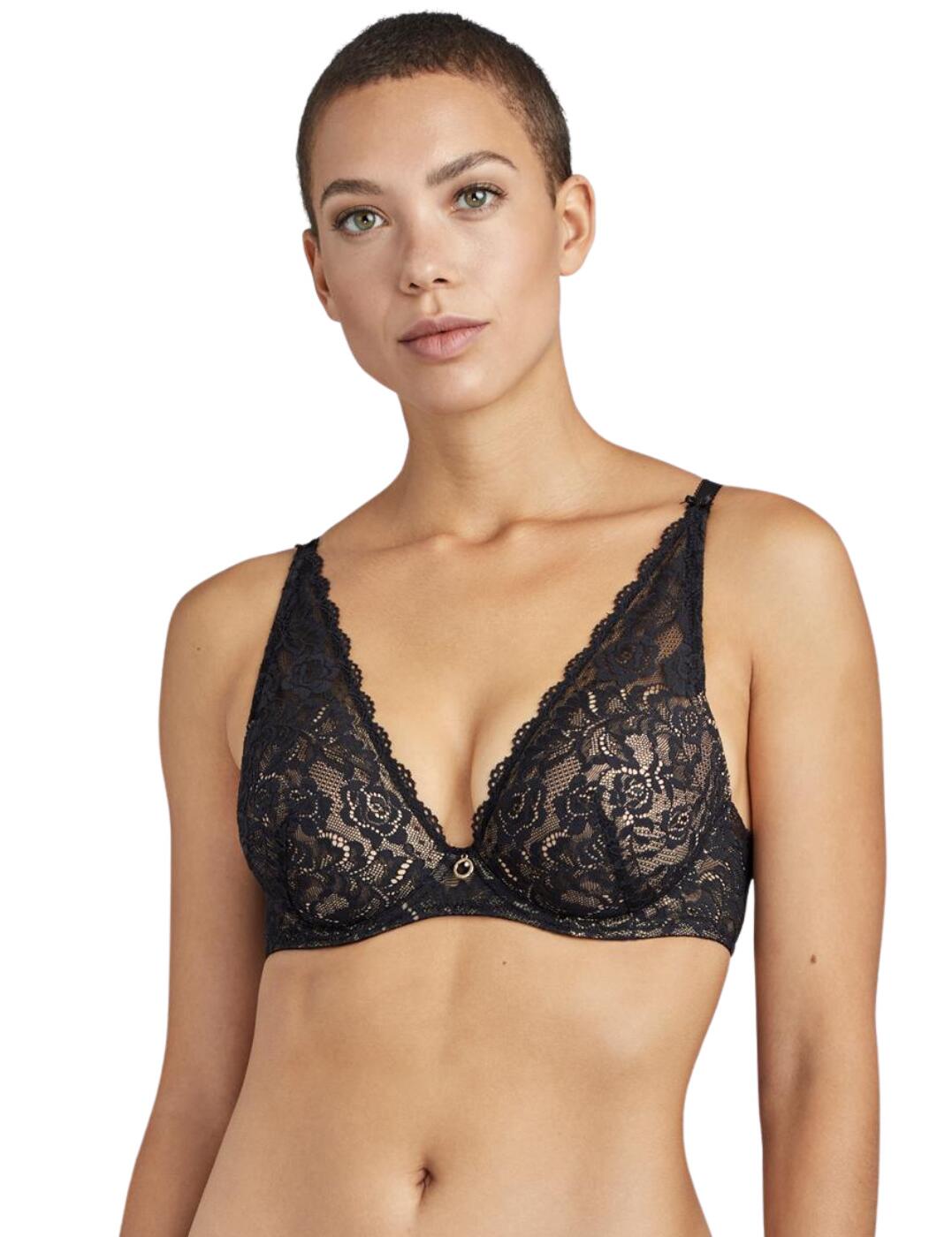 This beautiful Aubade Rosessence plunge bra is super soft and classy as it blends over your shoulders, gradually fading smaller as it passes up the neckline. Although the bra seems very minimal at the rear, it doesn't take anything away from the strength of the fastening, using the classic hook and eye closure. Made from high-stretch jacquard lace makes this piece is exceptionally lightweight and comfortable as it's not restrictive and enables the material to move with you as you go by your day. As well as having adjustability on the straps, they have also been elasticated to relieve pressure on your back and shoulders, with still having the supportive structure of a classic bra. As if this bra isn't cute enough, an Aubade branded ring lays flat between the cups acting as a centrepiece, as well as a crystal dropping down the middle highlighting the cleavage.  Aubade's Plunge Bra From the Rosessence line A both sexy and comfortable wear Hook and eye closure Pretty bows are placed on each side of the straps where they rest on the shoulders Full stretch lace back for maximum comfort Highly stretch, jacquard lace Elasticated adjustable straps with decorative picot A jewel placed in between cups featuring the Aubade logo with stunning crystals Non-restrictive Underwired for extra support Slightly padded Country of origin: Tunisia Composition: Lace: 82% Polyamide &pipe; 18% Elastane Composition: Cup lining: 100% Polyester Listed in UK sizes  57519-101553-1316752 HK81  Plunge Bra