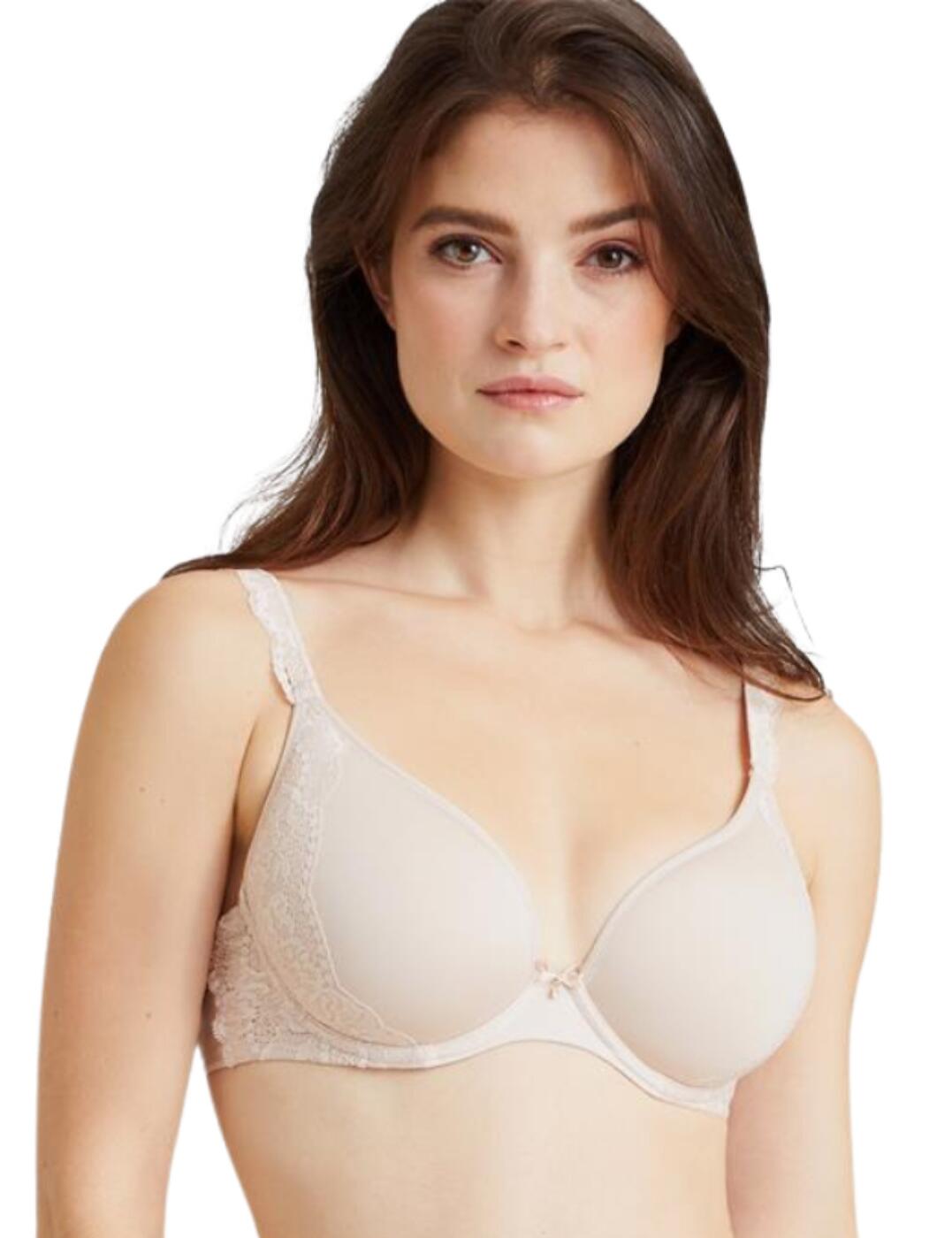 This beautiful plunge spacer bra from the Sweetessence series by Aubade is not only stunning in appearance but it's also eco-friendly as it's made with recycled knit fabrics! This bra shapes your bust, to give a fuller, rounded appearance thanks to rounded cups and underwiring that holds them up and prevents any spillages. Knitted lace runs all the way up from the sides of the bra up past the straps creating a layered effect. Even though this lacey structured bra is nothing less than eye-catching when placed underclothing it becomes almost invisible which is perfect for when you want to wear tight-fitting attire. Finishing this gorgeous bra off is a cute satin bow sitting between the two cups where a diamonte drops down, dangling from the bow, making this bra even more elegant than it already was and drawing more attention to your cleavage, making you look irresistible.  Aubade's plunge spacer bra From the stunning Sweetessence series Hook and eye closure Underwired for extra support Moulded cups for a firmer hold Everyday style with a sexy aesthetic Beautiful adjustable straps Recycled lace straps Comfortable recycled mesh Recycled decorated straps, mesh and lace The recycled materials are produced from recycled yarns derived from reused yarn waste, in a zero-waste process Satin bow and zinc jewellery for a refined touch Country of origin: Tunisia Composition: Lace: 72% Polyamide &pipe; 28% Elastane Composition: Lining: 100% Polyamide Composition: Lining side back: 100% Polyester Composition: Knit: 78% Polyamide &pipe; 22% Elastane Composition: Cup material: 89% Polyester &pipe; 11% Elastane Listed in UK sizes  57525-101563-1317344 IKN09  Plunge Spacer Bra