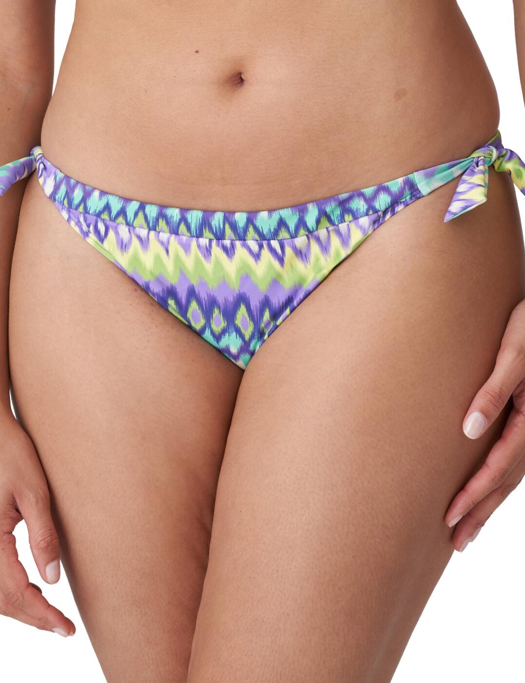 Add a flirty fresh look to your swimwear collection this season with this minimal tie-side bikini brief from the Holiday collection by Prima Donna. The adjustable side design allows you to create the perfect individual fit. The high-cut leg and low-rise waist flaunt your feminine silhouette. For a stylish look, wear with coordinating swimwear from the Holiday collection by Prima Donna.  Adjustable tie design Cheeky rear coverage Low-rise waist High leg design Country of origin: China Composition: 73% Polyamide &pipe; 27% Elastane Listed in UK sizes  57602-101650-1318233 4007153 Bikini Bottoms