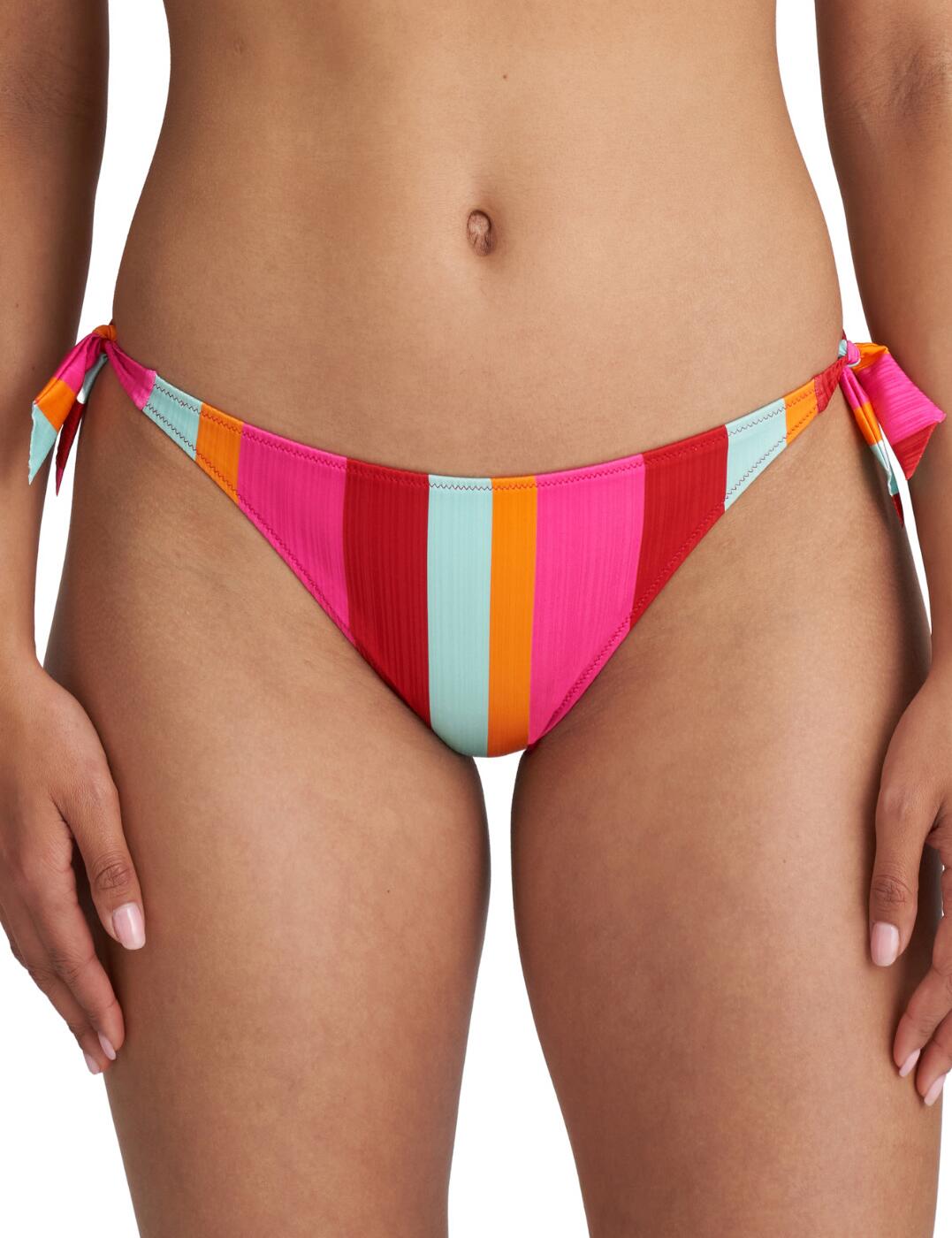 Give your beach outfit a classic look with a trendy twist with these bikini briefs from the Tenedos collection by Marie Jo. The traditional cut of a bikini brief with moderate rear coverage and low-rise waist is made that much more alluring with the higher leg cuts. The side-ties and bright colours of these bikini briefs allow for a fashionable and exciting look. Wear with other items from the Tenedos range by Marie Jo for a fully coordinated look.