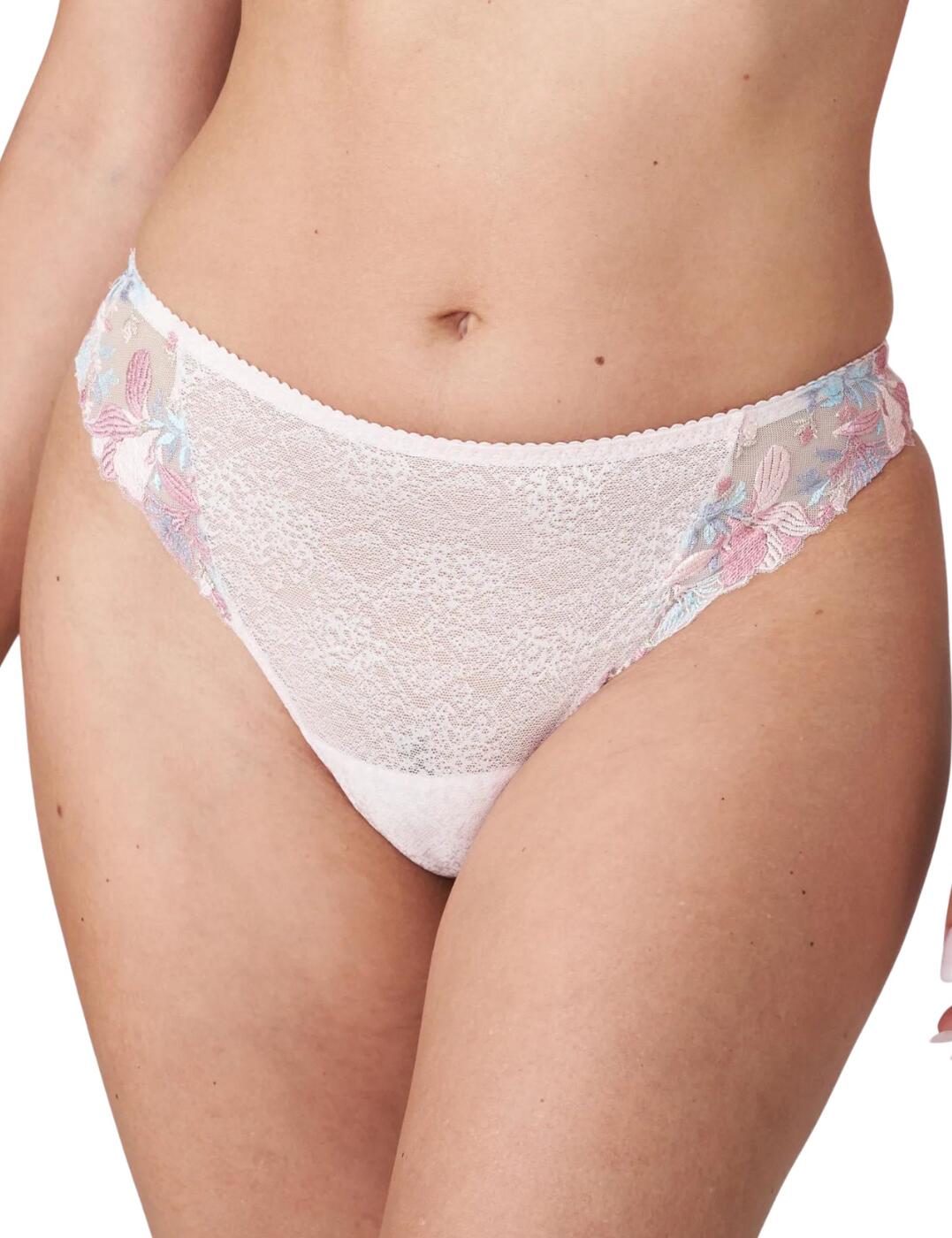 This thong from Prima Donna's Mohala range is feminine and flirty with lace-textured fabric complemented by floral embroidered sides that add a delicate touch. The mid-rise waist and minimal rear coverage give a comfortable fit and ensure this thong isn't visible under your clothes for worry-free wear. This thong has a cheeky keyhole cut-out on the rear that gives it a playful edge.