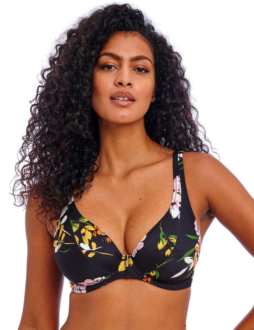 Experience classic elegance in your swimwear with the Twilight Soul high apex bikini top by Freya. Designed to combine sophistication and comfort, this underwired bikini top is a must-have in any holiday wardrobe. The underwire structure provides gentle support, while powernet-lined, non-padded cups promote your natural shape for a flattering silhouette. The low plunging neckline adds a touch of allure, with the delicate tie detail at the centre enhancing the playful charm of the piece. Adorned with a classic floral print for ultimate beach vibes, this bikini top is secured with a plastic clasp closure and adjustable straps for a personalised fit. Wear with matching swimwear from the Twilight Soul collection for an exceptional poolside ensemble.
