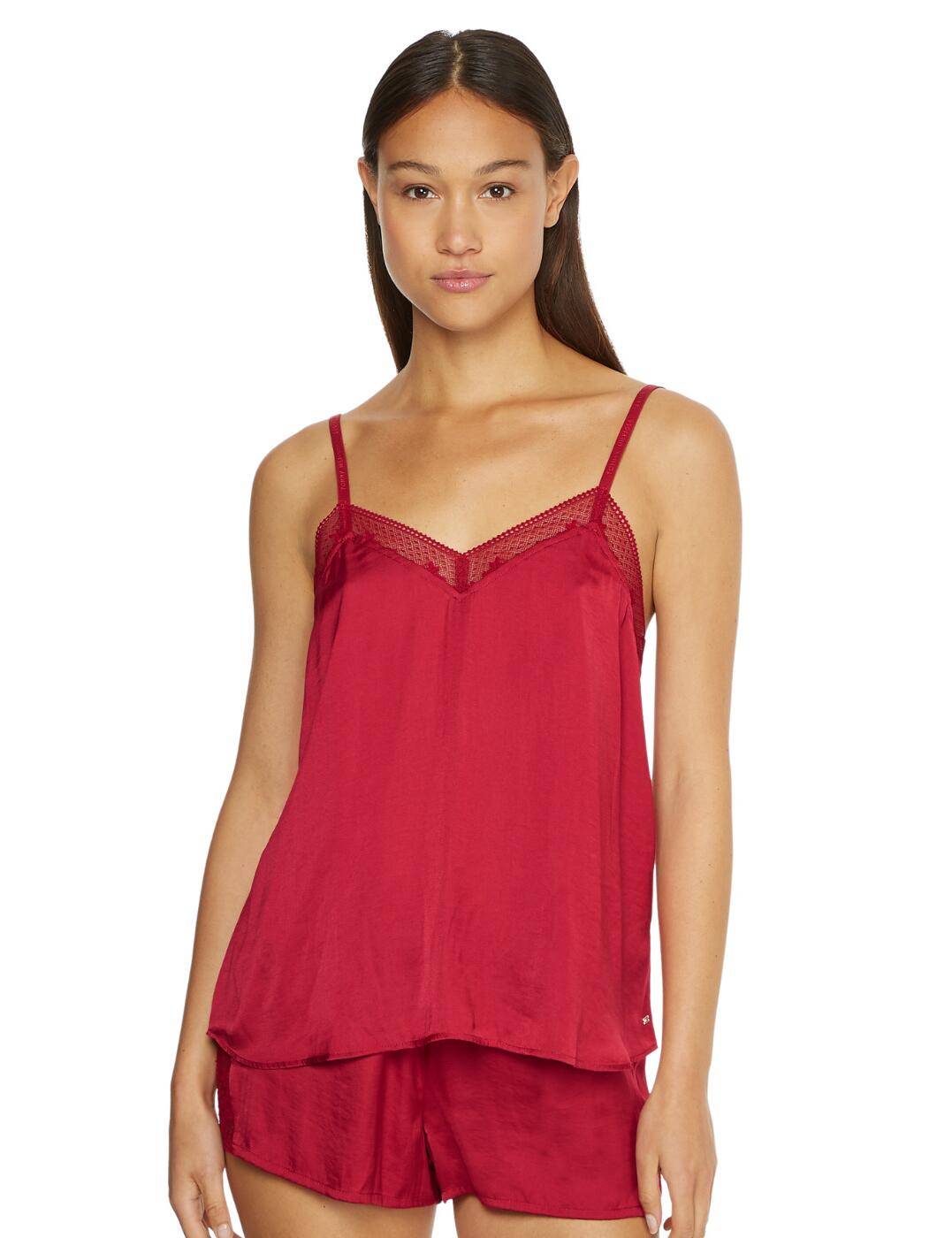 Embody true comfort with this Tommy Hilfiger Ditsy Lace pyjama set this season. Perfect for catching up on your beauty sleep, this pyjama set is crafted from a soft satin material and boasts a relaxed fit for a comfortable feel with no restrictions on movement. The top features adjustable shoulder straps and is cut to a V-neckline for a chic flirty feel with the floral lace trim adding an elevated look. The shorts fall to a mini-length and are lightweight and breathable with a soft elasticated waistband ensuring they are secure when lounging. The shorts have a floral lace insert to add a cheeky flair to this gorgeous piece.  Top: Ditsy floral lace trim Adjustable shoulder straps Signature Tommy Hilfiger branding Relaxed fit V-neckline Shorts: Floral lace insert Elasticated waist Min-length Country of origin: China Composition: 55% Recycled Polyester &pipe; 45% Polyester Listed in UK sizes  58273-102611-1339544 UW0UW03848 Pyjama Set