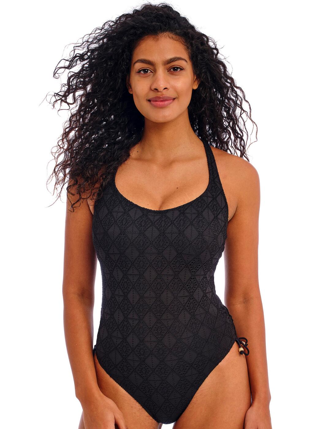 Sure to become your go to swimwear for your next holiday, this gorgeous swimsuit from Freya's Nomad Nights collection is both flattering and comfortable, giving you confidence and style all day long! Beautiful crochet overlay in a stunning diamond pattern across this piece exudes a modern, trendy vibe. The clever design of this piece includes concealed underwire for excellent support that compliments your figure wonderfully. The wide straps create a scoop neckline that enhances your curves. Furthermore, the scoop leg line elongates your legs giving you a slimmer appearance. A keyhole cut out detail on the back adds to the eye-catching style of this swimsuit, while the convertible, adjustable back straps and back clasp fastening give you optimal support and a customisable fit! This one piece is not one to be missed!