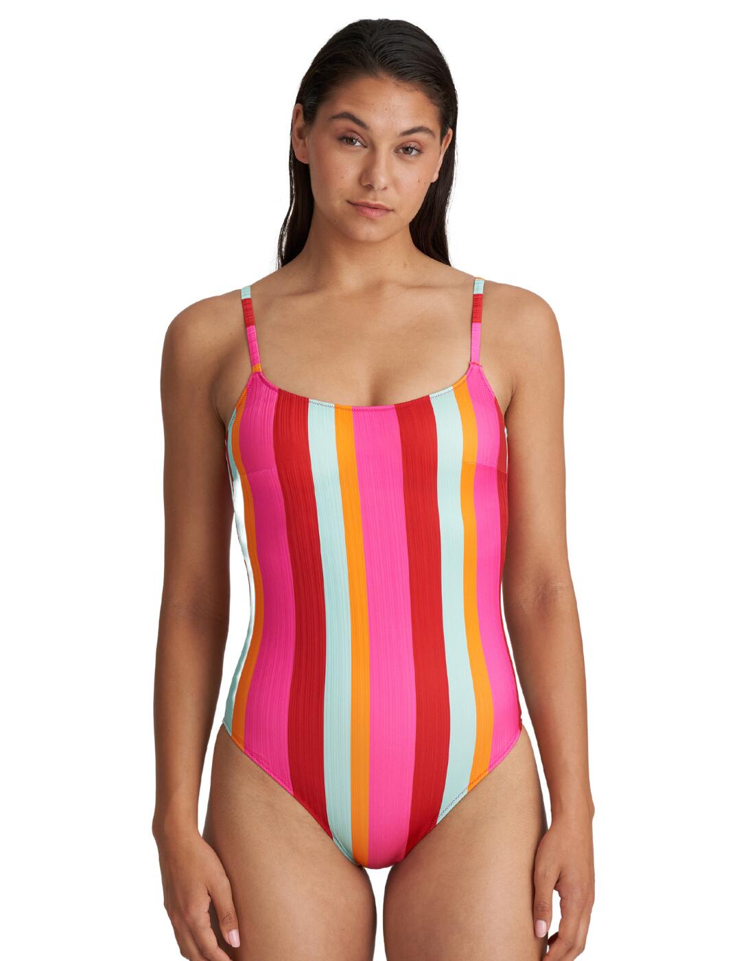 The Tenedos swimwear range from Marie Jo allows you to wear comfortable designs in intriguing new colours. This simplistic swimsuit is made in the traditional pull-on style with full-cup coverage. To set it off, this piece boasts trendy bright colours and fashionable patterns, which will make you the centre of attention, with the deep open back and moderate rear coverage only emphasizing your natural beauty. Adjustable shoulder straps make sure that you can adapt this piece to your most comfortable fit.