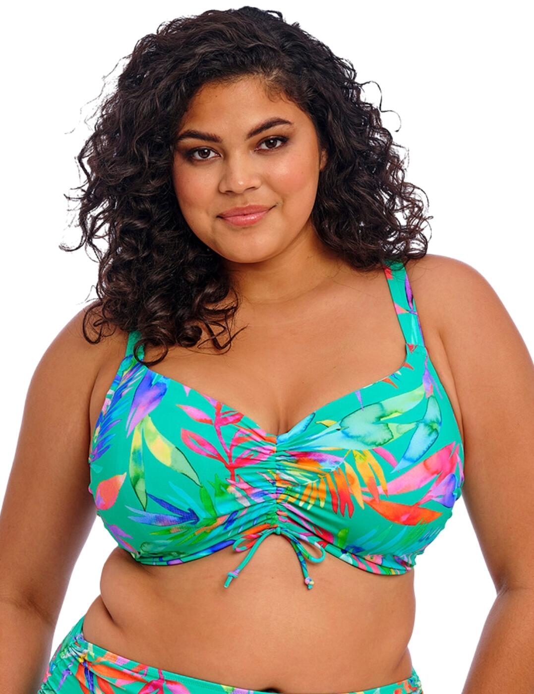 Welcome to the tropical oasis that is Elomi Toyama Tides adjustable bikini top! Designed with a bright and lush tropical print, this bikini top will transport you to the shores of the Toyama Tides. The full cup coverage and concealed 3-part cups provide the perfect amount of coverage and support, so you can relax and soak up the sun. And the underwire ensures that everything stays in place, so you can play and swim without any distractions. The tie detail allows you to switch up your look from a classic balcony neckline to a trendy sweetheart neckline. Plus, the adjustable shoulder straps and classic back clasp ensure a perfect fit for any body type. And the best part? There is a matching bikini available, so you can create a complete and cohesive swimwear look with ease.