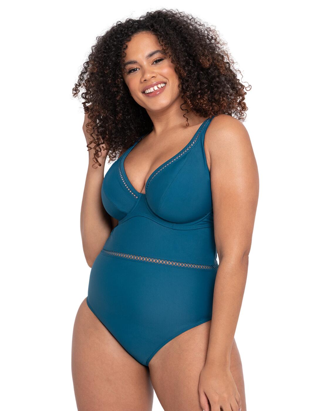 This First Class swimsuit from Curvy Kate is structured to reflect a comfortable design, while still allowing for a trendy look with the cheeky criss-cross cutouts on the decolletage and around the waist. The deep plunging neckline accentuates your curves, while the underwired lightly lined cups make sure that your bust is properly supported. The pull-on design is reinforced by a plastic barrow clasp closure at the back. Adjustable shoulder straps can be arranged in 3 different ways, giving you a new style every day.  Deep plunging neckline Stylish criss-cross cutouts Smooth elastic material Adjustable multiway shoulder straps Swimwear clicker back closure Moderate rear coverage Underwired Lightly lined cups Country of origin: China Composition Main: 80% Recycled Nylon &pipe; 20% Xtra Life Lycra Composition Lining: 85% Polyester &pipe; 15% Elastane Composition Lining 2: 100% Polyamide Composition Mesh: 65% Nylon &pipe; 35% Elastane Composition Wing Mesh: 73% Nylon &pipe; 27% Elastane Listed in UK sizes  58451-102816-1341731 CS020605 Swimsuit