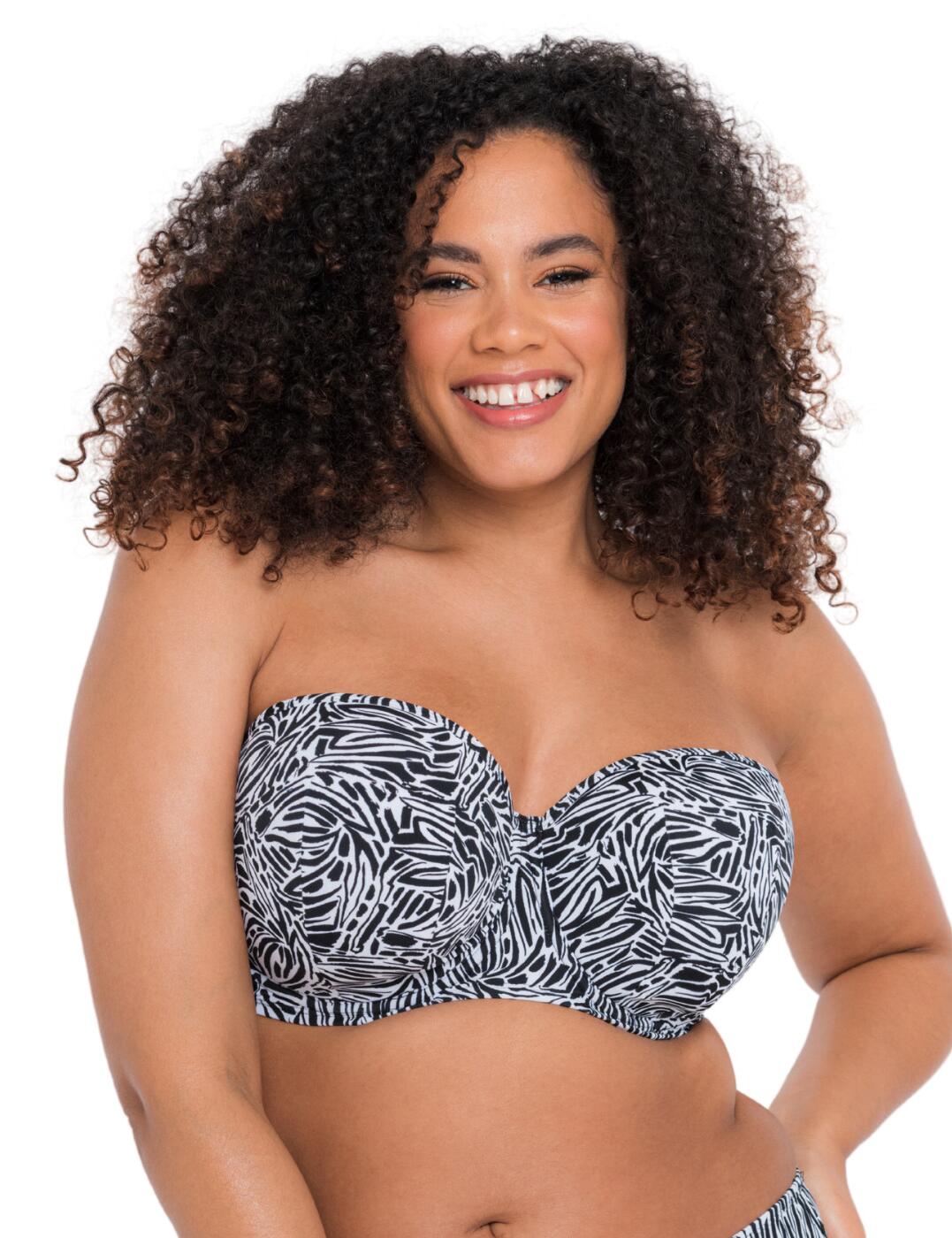 The Sundown collection by Curvy Kate reflects all of the favourite swimwear styles in new and exciting patterns. The design of this bandeau bikini top is based on the bestselling Luxe model from Curvy Kate to make sure that your holidays are spent in absolute comfort. The padded underwired cups shape your decolletage and accentuate your curves beautifully. This item features detachable shoulder straps that can be worn in multiple exciting ways to mirror your favourite style.  Classic balcony-style neckline Multiway adjustable and detachable shoulder straps Interesting abstract print throughout Plastic barrow clasp closure Underwired Padded Matching coordinates available Country of origin: China Composition Main: 80% Nylon &pipe; 20% Xtra Life Lycra Composition Lining: 100% Polyamide Composition Lining 2: 100% Polyester Composition Wing Mesh:75% Polyamide &pipe; 25% Elastane Listed in UK sizes  58524-102932-1344310 CS025307 Padded Balcony Bikini Top