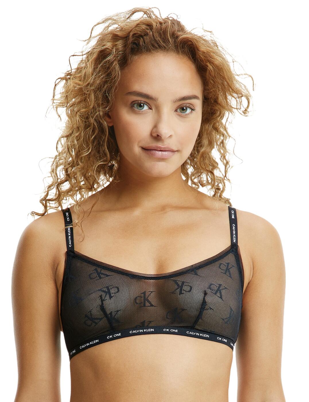 The seductive CK One Logo Mesh collection combines Calvin Klein's renowned designer athleisure style with flirty semi-sheer tulle fabrics. This sexy bralette flaunts the iconic CK One logo in a repeated motif across the premium mesh. The logo continues along the under-band and shoulder straps creating a recognisable sports-luxe style. Adjustable shoulder straps and the non-wired design create the utmost comfortable fit. For a sexy coordinated look, wear with matching briefs from the luxurious CK One Logo Mesh collection by Calvin Klein.  Sexy semi-sheer CK branded mesh fabric Repeated Calvin Klein logo under-band Sports-luxe bralette style Adjustable shoulder straps Hook and eye closure Non-wired and non-padded Country of origin: Sri Lanka Composition: 71% Polyamide &pipe; 29% Elastane Listed in UK sizes  54326-97054-1280466 000QF6786E Bralette