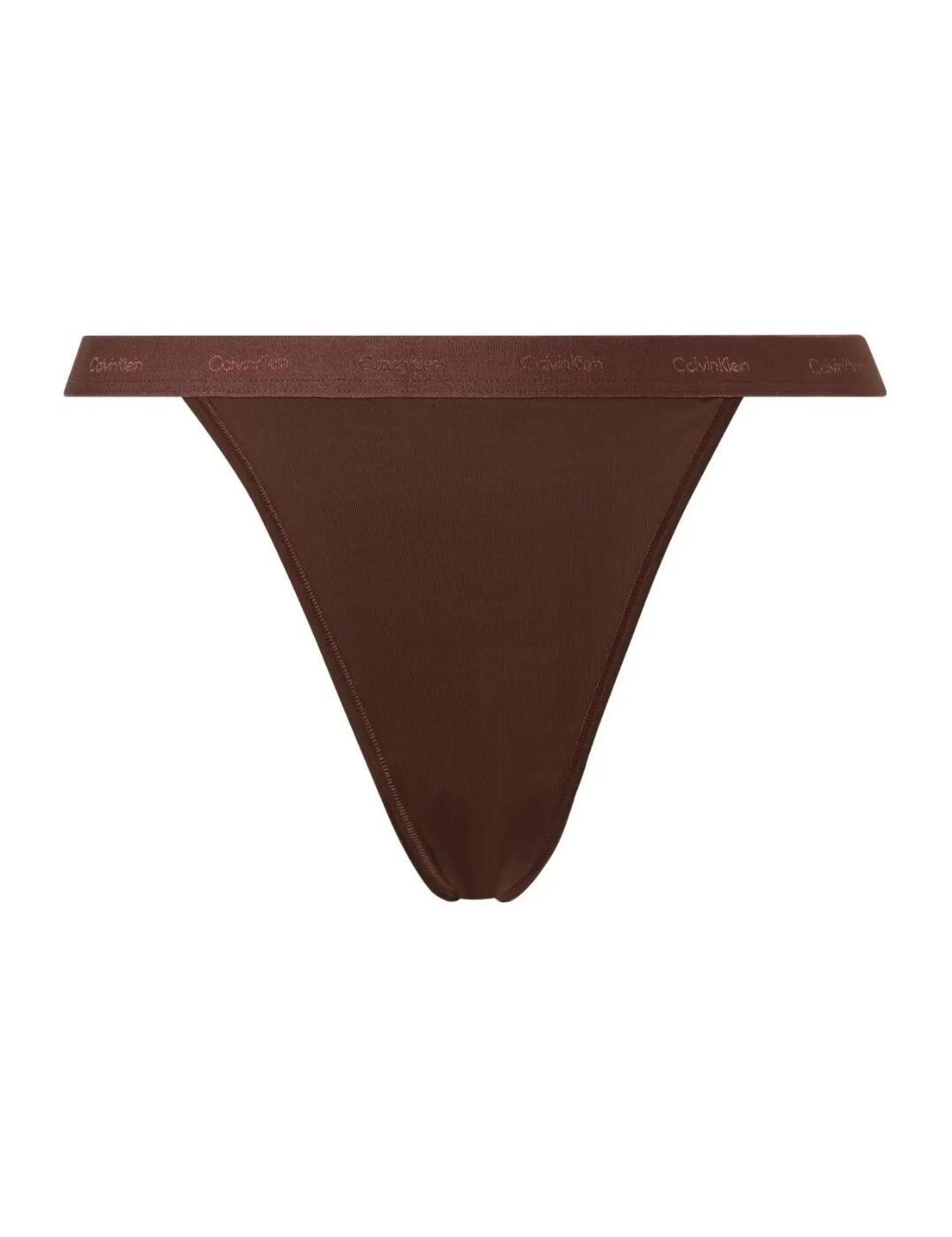 The Form To Body Tanga by Calvin Klein is the perfect addition to your everyday lingerie collection. The tanga is the perfect flirty medium between a thong and a bikini brief. The super-slim waistband reveals your hips and thighs, giving you an alluring appearance. Minimal rear coverage highlights your curves and preserves comfort. For a coordinated look pair with one of the matching bras from the range.  Calvin Klein branding on the waistband Cheeky rear coverage High-leg style flatters the hips and thighs Country of origin: Sri Lanka Composition: 81% Nylon &pipe; 19% Lycra Elastane Listed in UK sizes  54805-97921 000QF6760E Tanga Brief