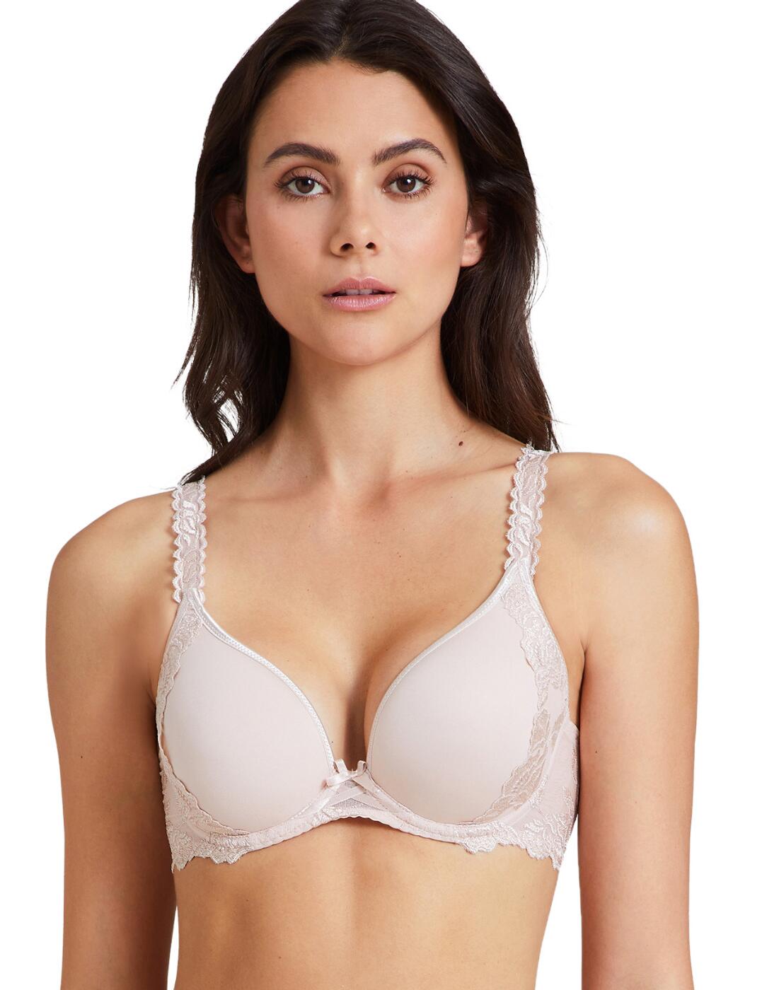 The Softessence plunge spacer bra by Aubade is the perfect upgrade to your daily lingerie collection. The lightweight fabric allows your skin to breathe and provides superior comfort. The plunging neckline highlights your curves and allows you to easily conceal your lingerie under clothing. The soft moulded cups create a smoother silhouette perfect for wearing with close-fitting tops. Mesh wings are adorned with graceful embroidery giving this bra a glamourous twist. Soft scalloped edges ensure a comfortable fit that contours to your body naturally.  Graceful embroidery on smoothing mesh wings Partially adjustable shoulder straps Hook and eye closure Country of origin: Tunisia Composition: Embroidery: 47% Polyester &pipe; 38% Polyamide &pipe; 15% Elastane Composition: Middle embroidery: 46% Polyamide &pipe; 35% Polyester &pipe; 19% Elastane Composition: Lining: 100% Polyamide Composition: Cup: 89% Polyester &pipe; 11% Elastane Listed in UK sizes  54979-98084-1272391 TMN09 Spacer Plunge Bra