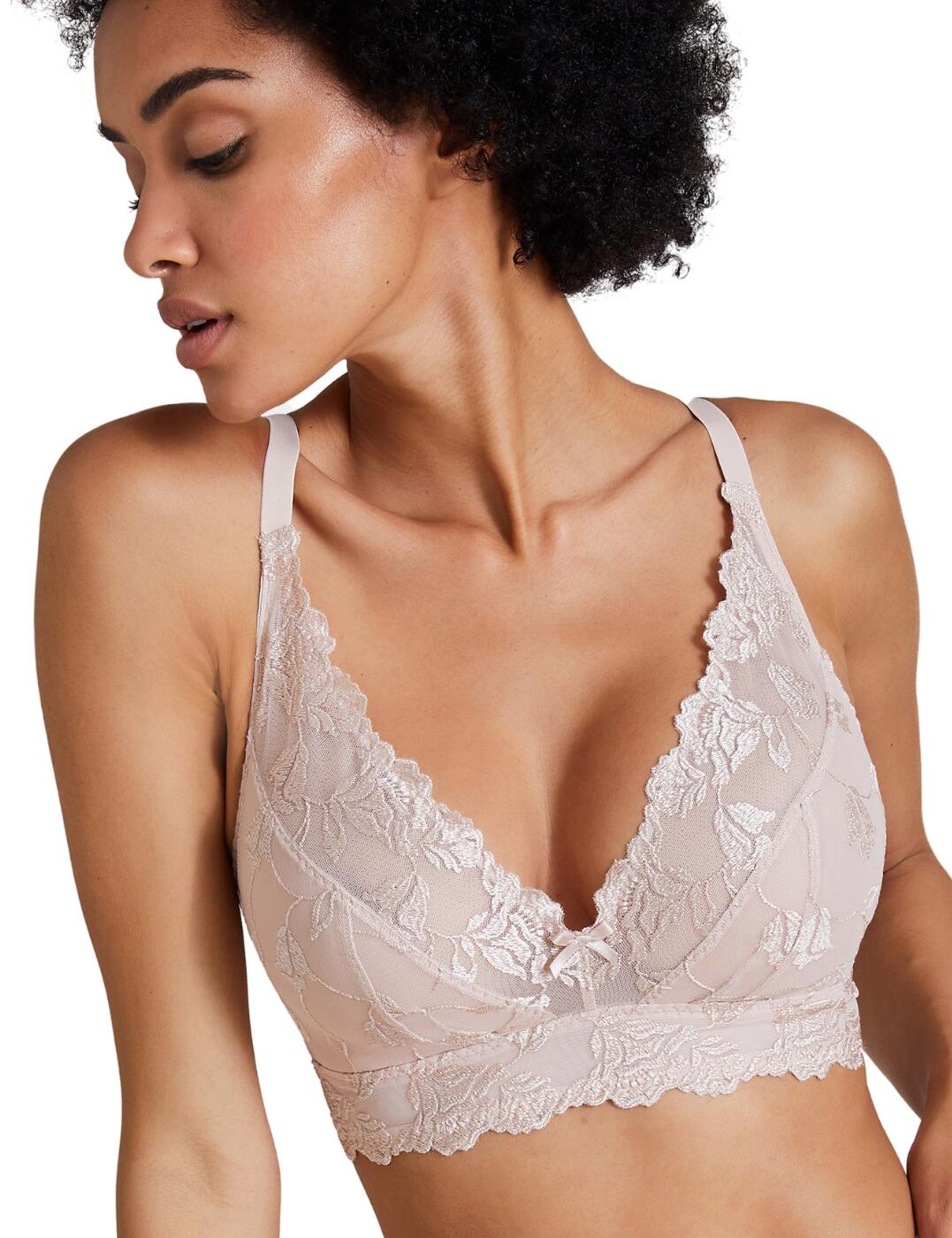 Experience true comfort with the Softessence padded bralette by Aubade. This piece is a true lingerie staple. The soft sheer mesh fabric creates a seductive and feminine appearance, effortlessly. Delicate embroidery adds to the glamour of this piece. Wireless cups offer a natural feel and shape, a small reinforced seam under the bust offers light support. The feminine longline design conceals the internal support and offers a complimentary fit thanks to its soft scalloped edges. Light padding offers a smoother silhouette and comfort.  Plunging cups highlight your curves Adjustable shoulder straps Hook and eye closure Wireless with supportive underbust seam Hook and eye fastening Country of origin: Tunisia Composition: 46% Polyamide &pipe; 35% Polyester &pipe; 19% Elastane Composition: Lower embroidery: 47% Polyester &pipe; 38% Polyamide &pipe; 15% Elastane Composition: Top embroidery: 64% Polyester &pipe; 36% Polyamide Composition: Inner lining: 100% Polyester Composition: Top lining: 77% Polyamide &pipe; 23% Elastane Listed in UK sizes  54980-98094-1274100 TM10-O Padded Bralette