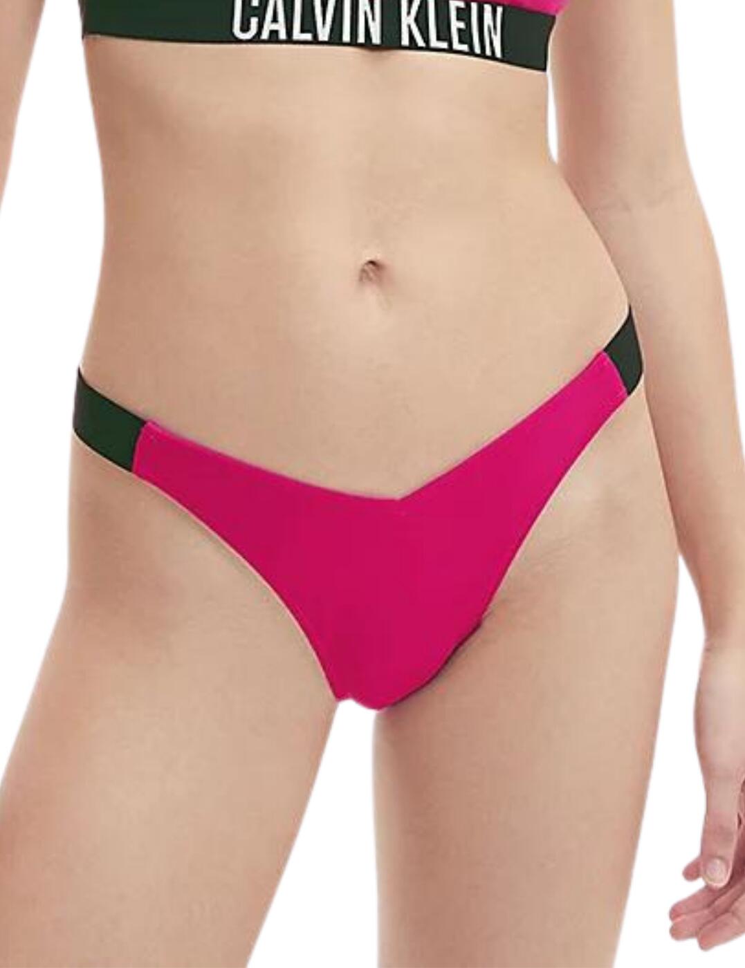 The Intense Power range from Calvin Klein offers elevated athleisure for you to fall head over heels for. This bikini brief is highly flattering with the specially designed V-waist cut that highlights and accentuates your silhouette in the way you deserve. A total jaw-dropper, this piece also features the iconic Calvin Klein waistband detailing to frame your figure even further. Fully lined with medium rear coverage, this bikini brief has you covered, while still allowing you to showcase some sunkissed skin this season.  Athleisure but make it cute Made with 78% sustainably sourced fabric Iconic Calvin Klein waistband detailing Fully lined Medium rear coverage Front v-waist cut High-cut sides Country of origin: Vietnam Composition: 78% Recycled Polyamide &pipe; 22% Elastane Listed in UK sizes  54987-98348-1299463 KW0KW01726  Bikini Briefs