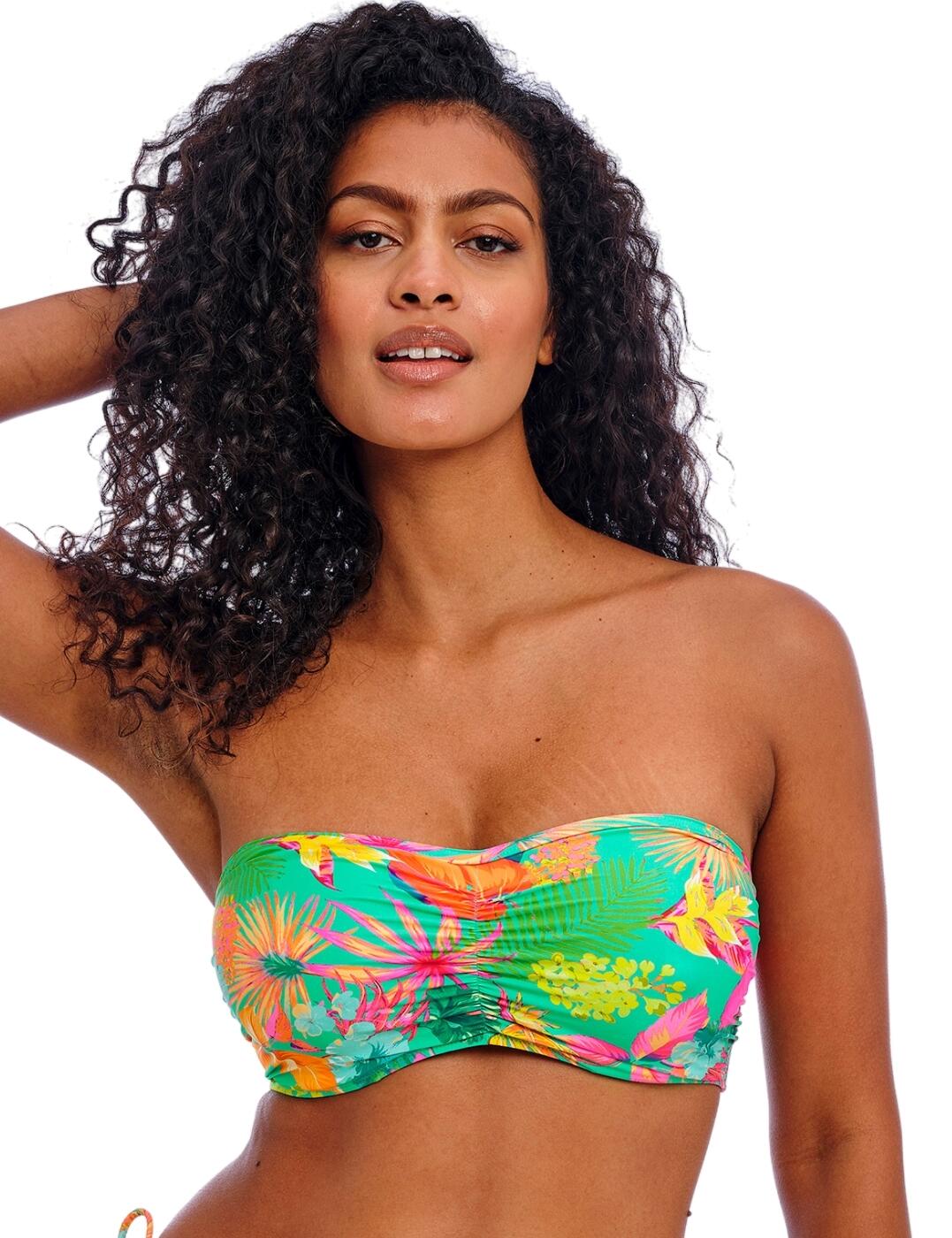 Discover game-changing new designs by Freya such as the Isla Margarita bandeau bikini top. Featuring a classic balcony neckline, this bandeau top is designed to accentuate your natural curves in all the right places. The rich colours and intricate details of the print instantly brighten your outfit for a head-turning look. This top also boasts a concealed underwire for added support without any uncomfortable padding. The gathering at the bust adds a flattering touch, making you feel confident and beautiful in your own skin. For those long days by the pool, the Freya Isla Margarita also offers removable neck ties and adjustable and removable shoulder straps. With a classic back clasp closure, you can trust that this top will stay in place and keep you feeling secure all day long. The Freya Isla Margarita collection also offers matching coordinates, so you can mix and match to create your perfect swim ensemble.